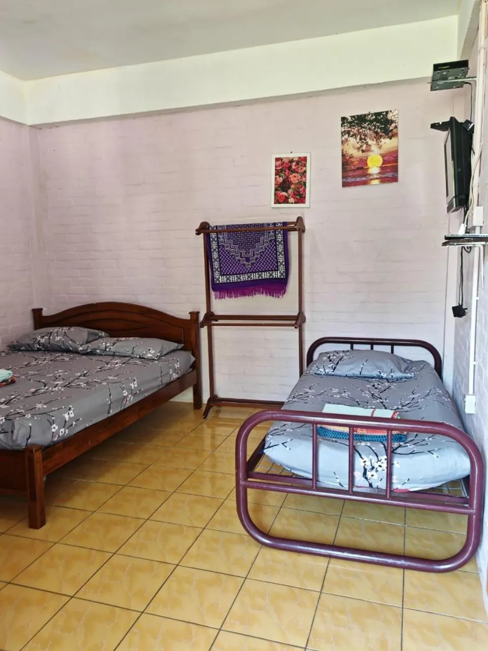 Bed in KAMILA MOTEL TELUK SENANGIN