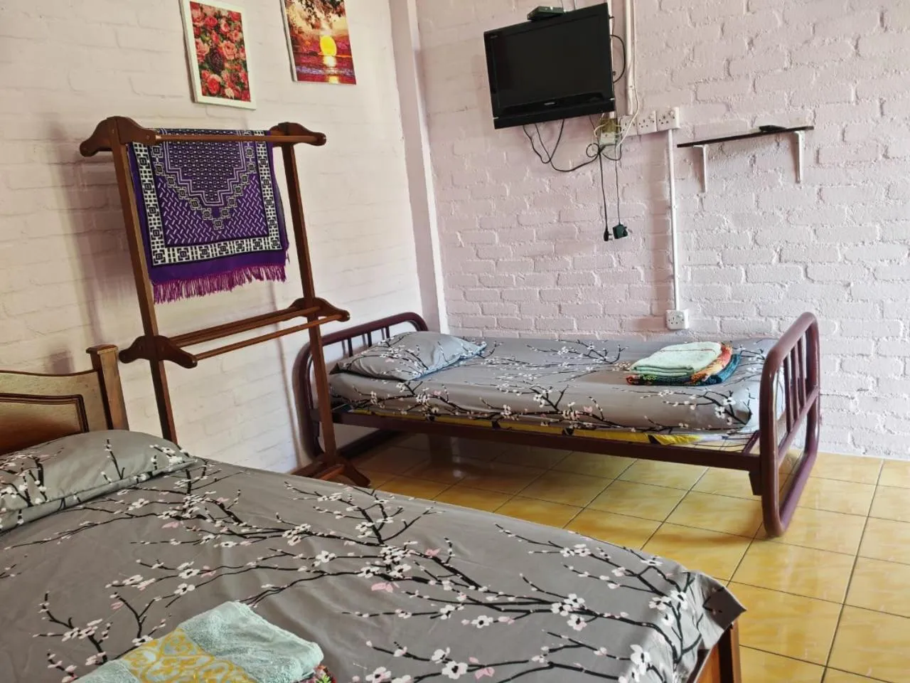 Bed in KAMILA MOTEL TELUK SENANGIN