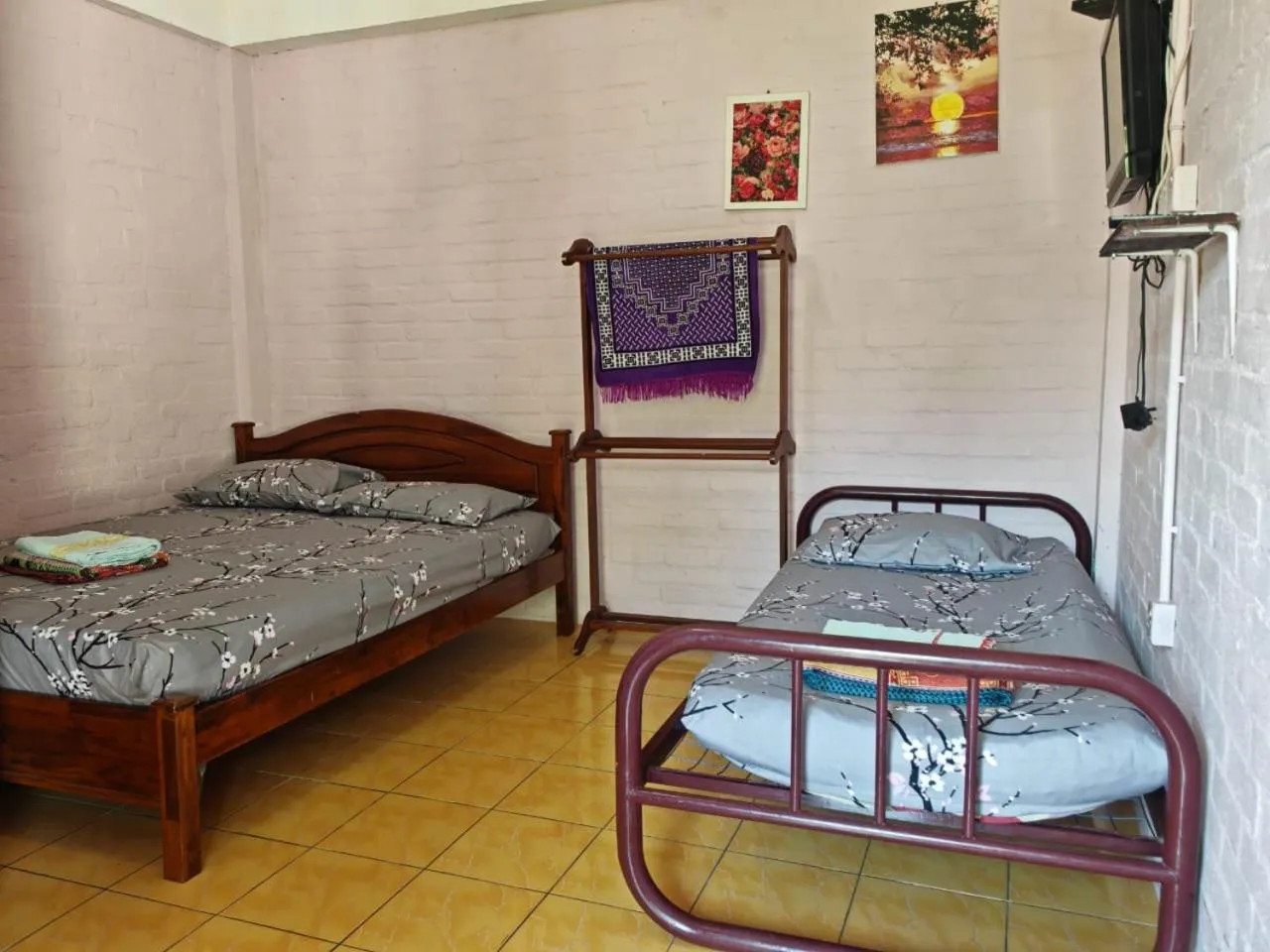 Bed in KAMILA MOTEL TELUK SENANGIN