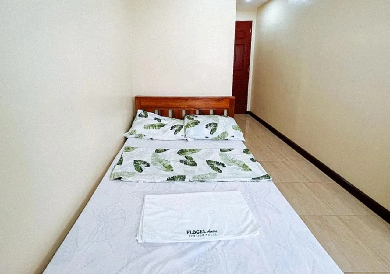 Bedroom in Flogel Amore Pension House