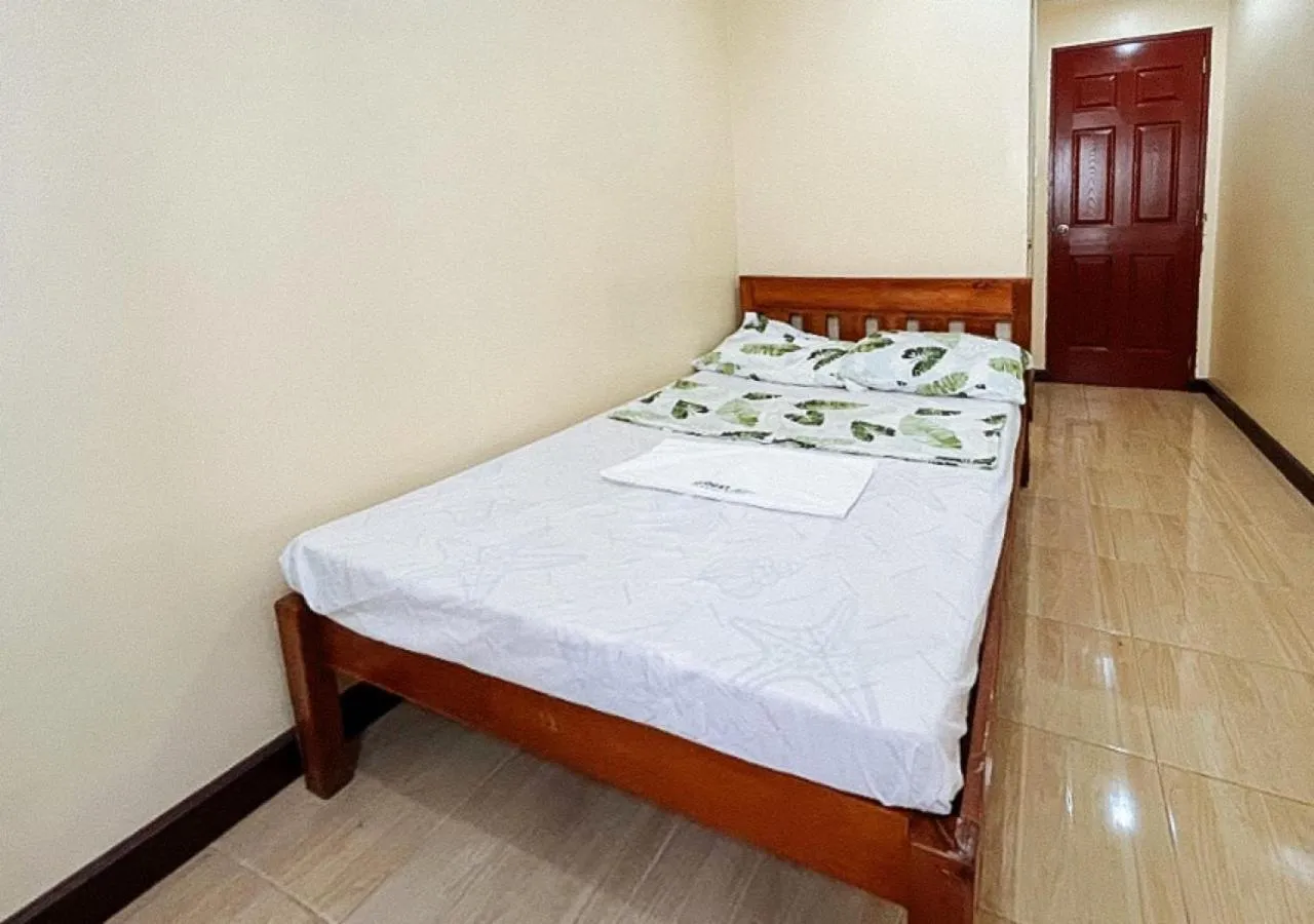 Bed in Flogel Amore Pension House