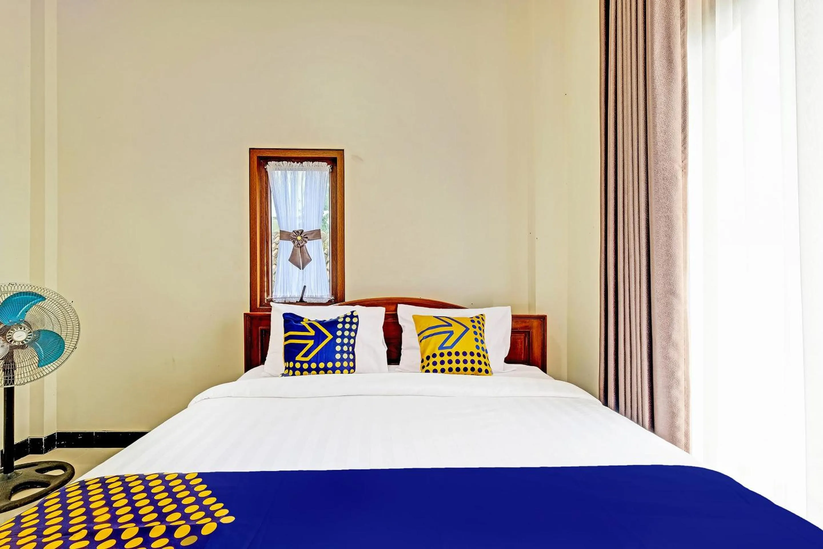 Bedroom in OYO Homes 91095 Desa Wisata Conto