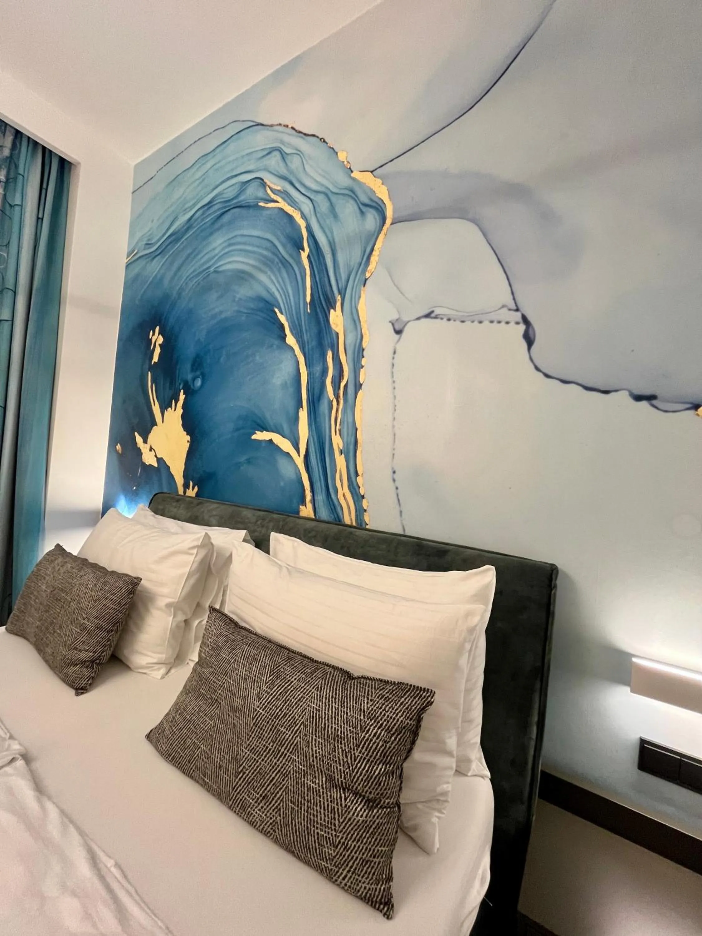 Bed in Street Living Hotel - Apartments