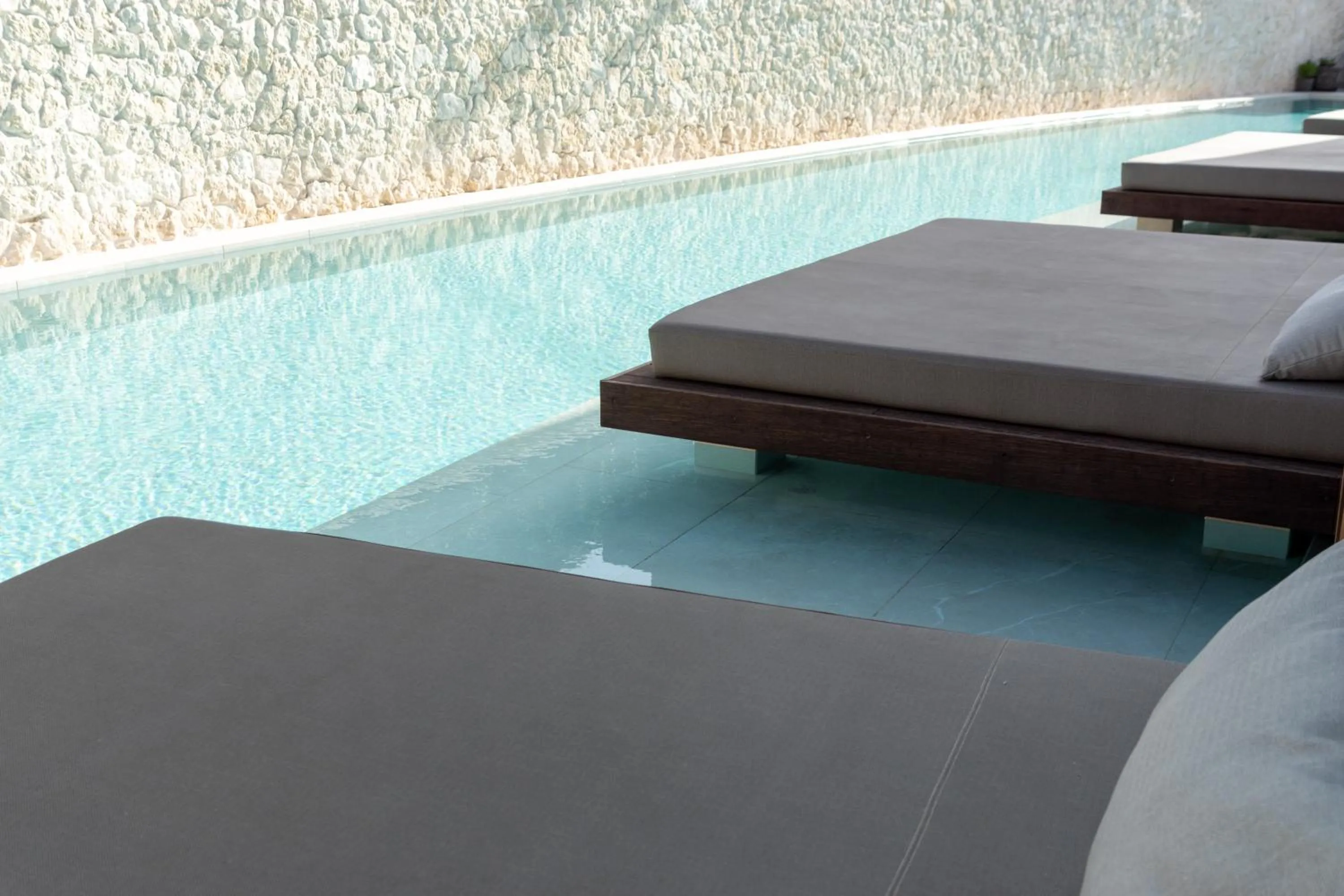 Swimming pool in TenSuites - Adults Only