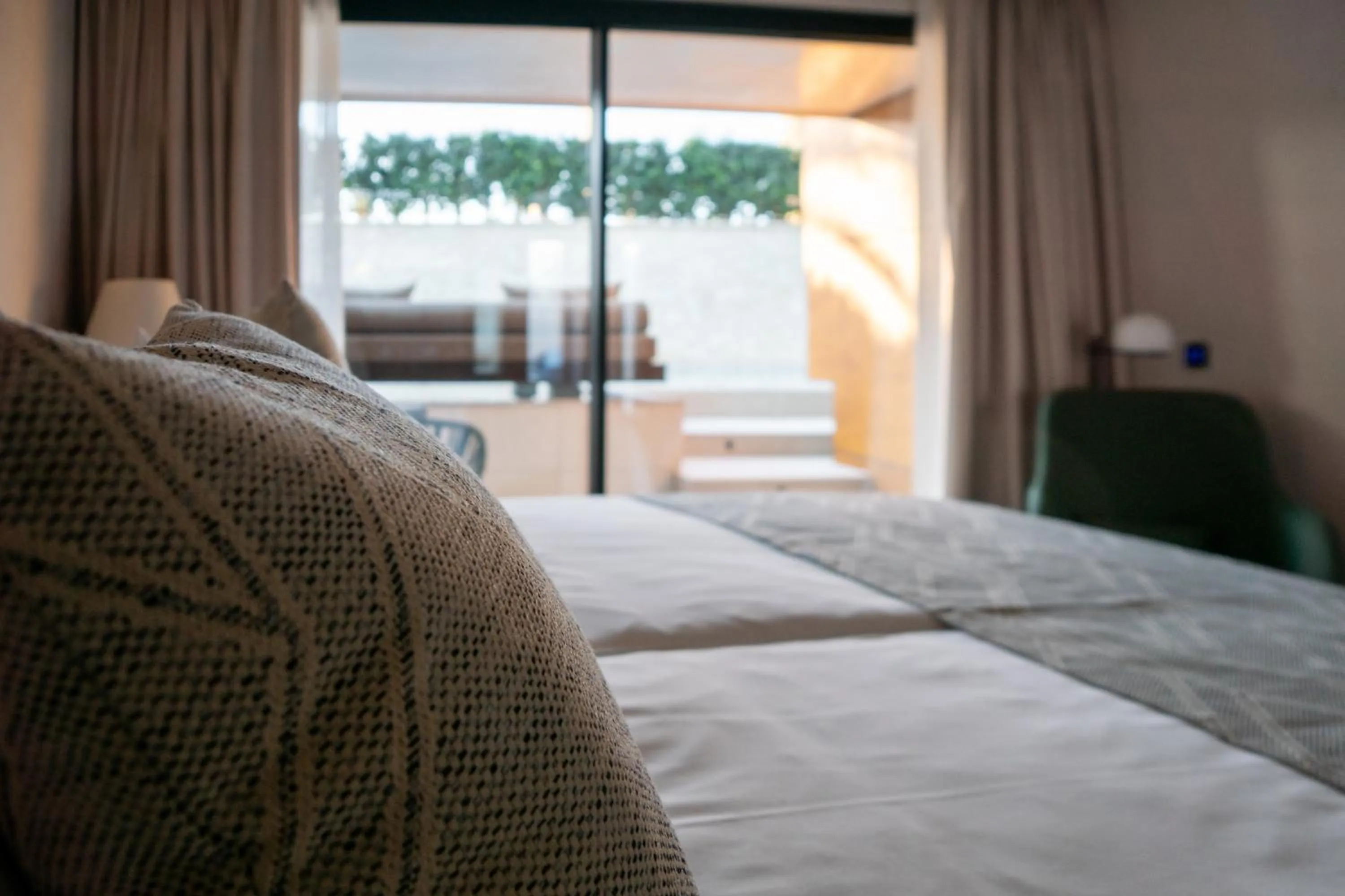 Bed in TenSuites - Adults Only