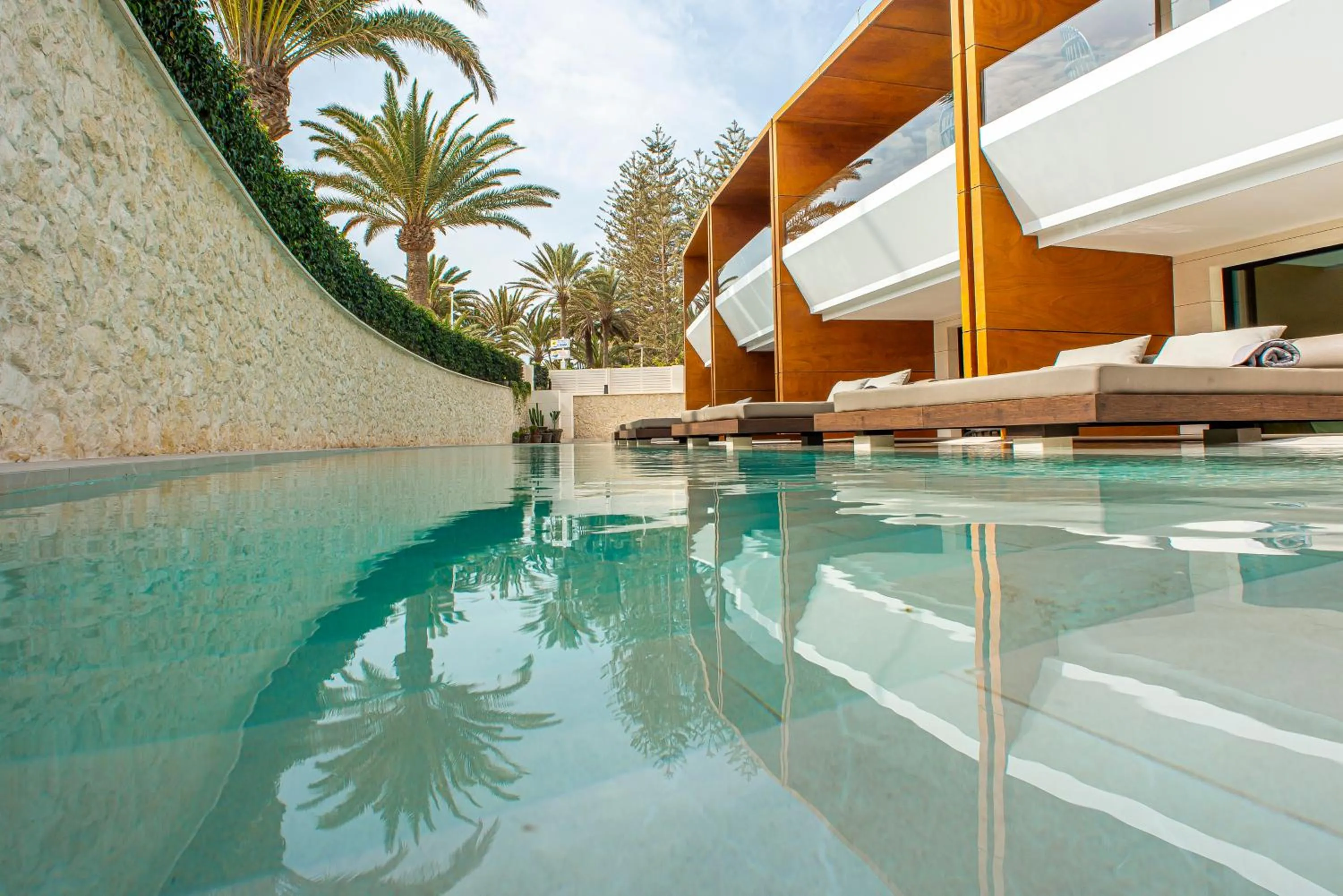 Swimming pool in TenSuites - Adults Only