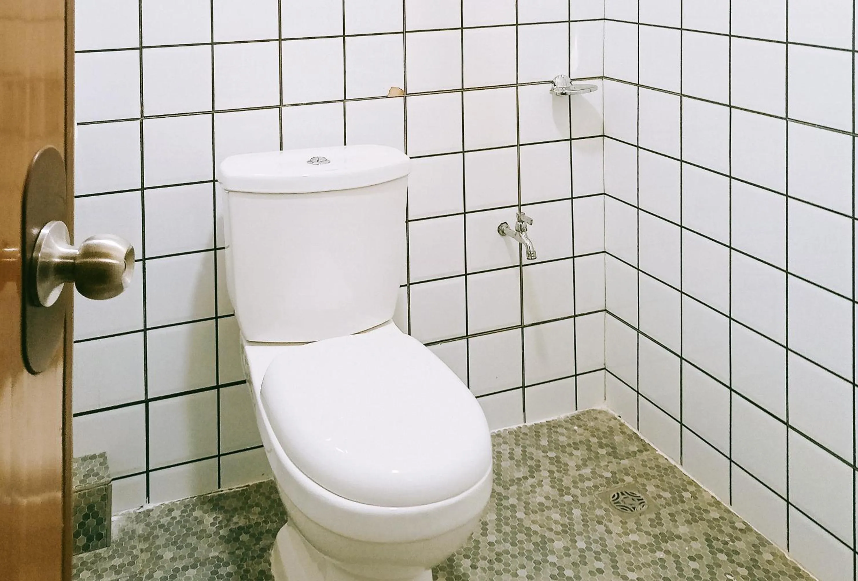 Bathroom in Maribel’s Pension Sindangan