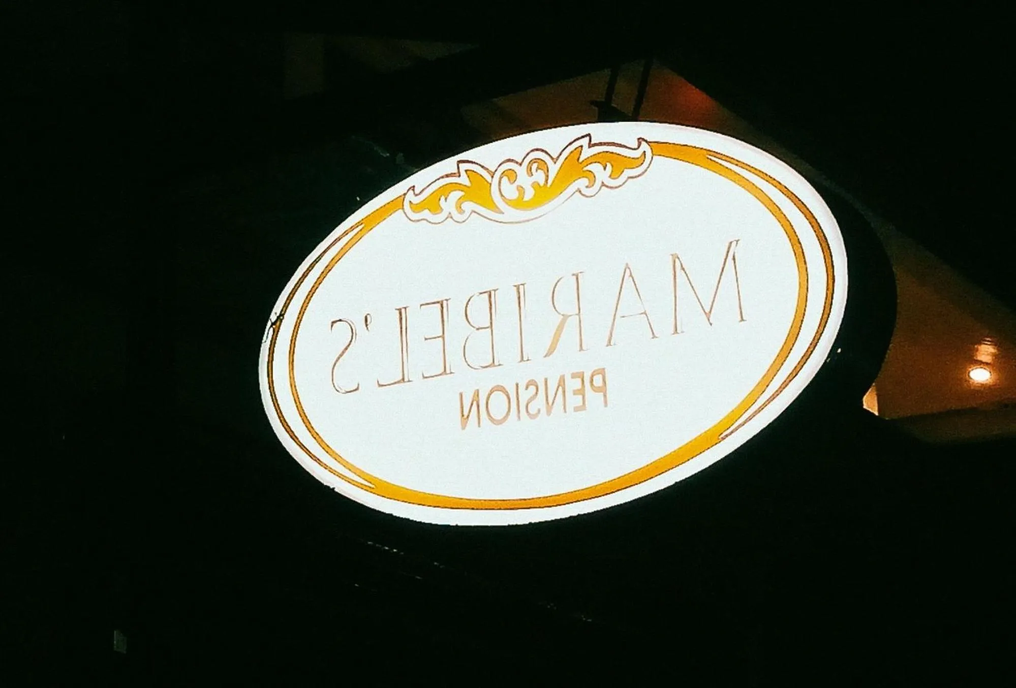 Logo/Certificate/Sign in Maribel’s Pension Sindangan