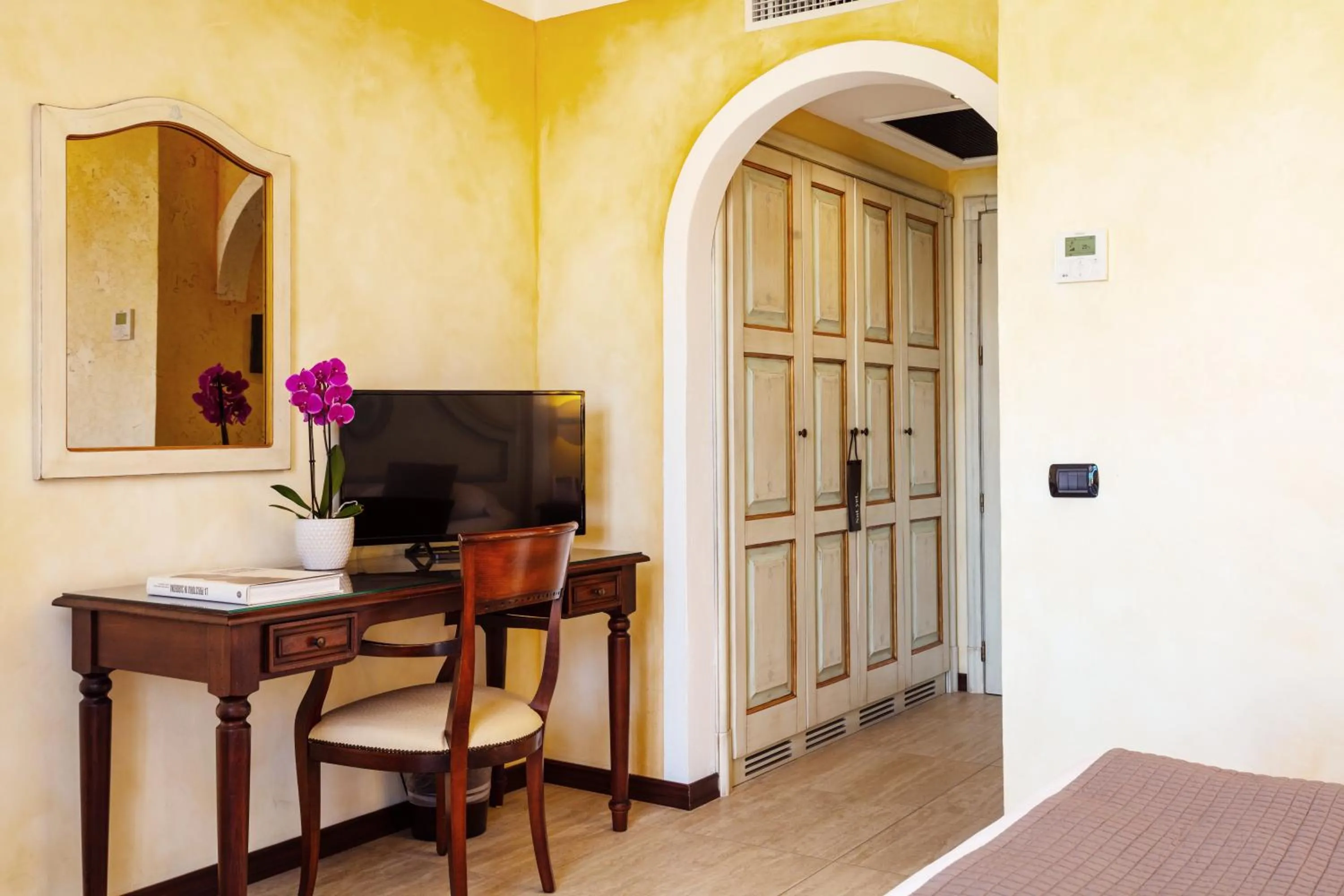 TV and multimedia in La Vecchia Fonte Boutique Hotel