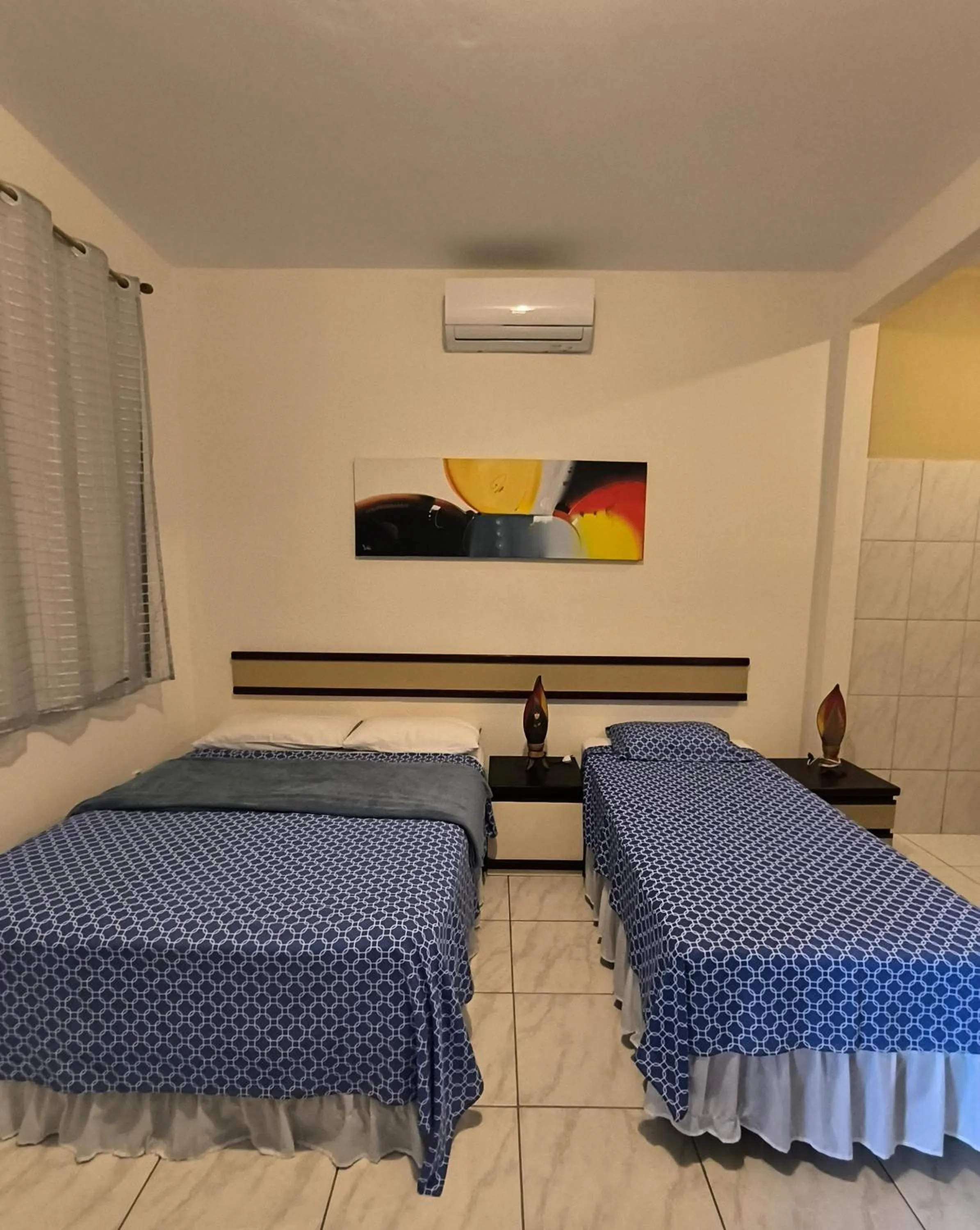 Bed in Pousada Casarão 2030