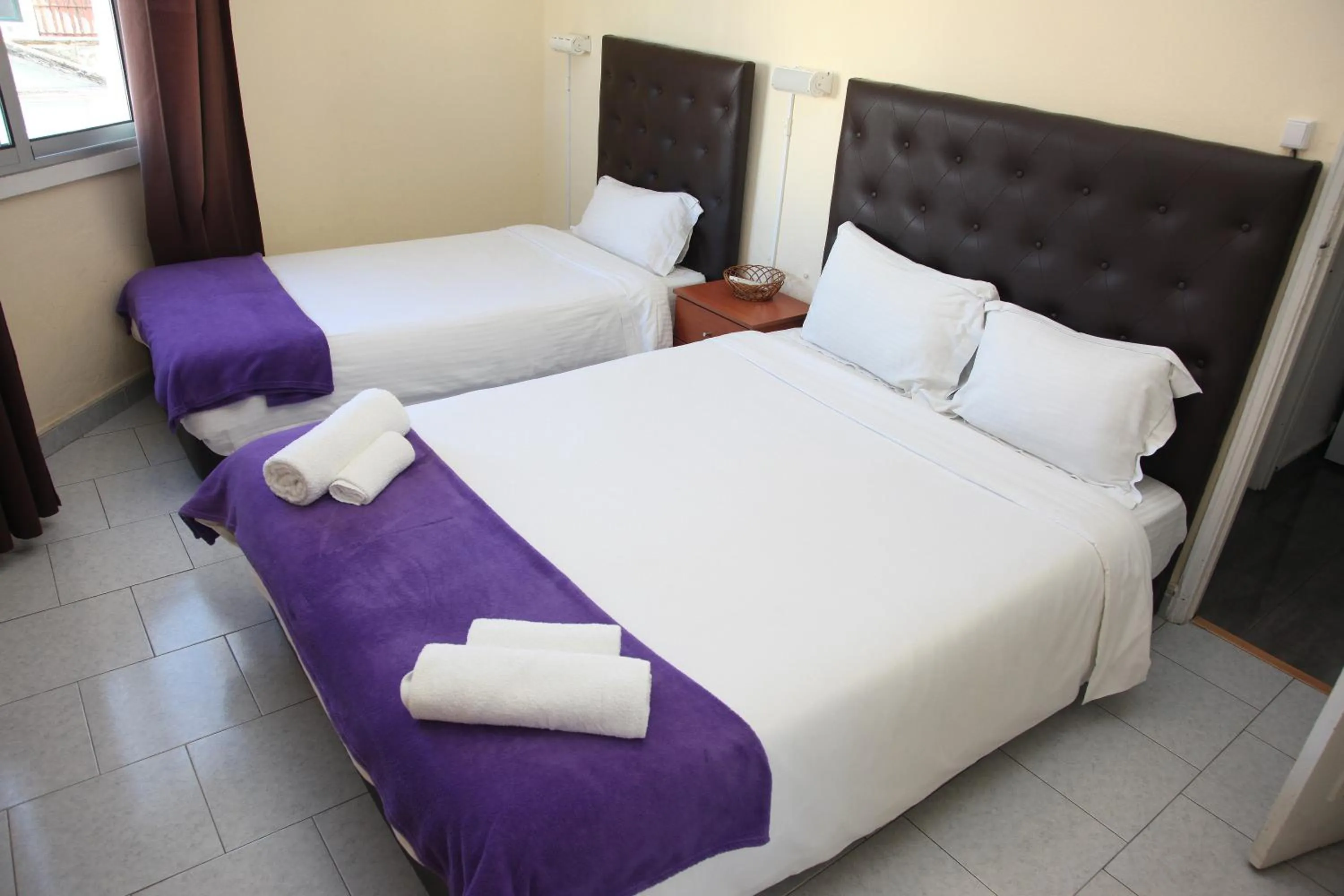 Bed in Lisbon Suite Home