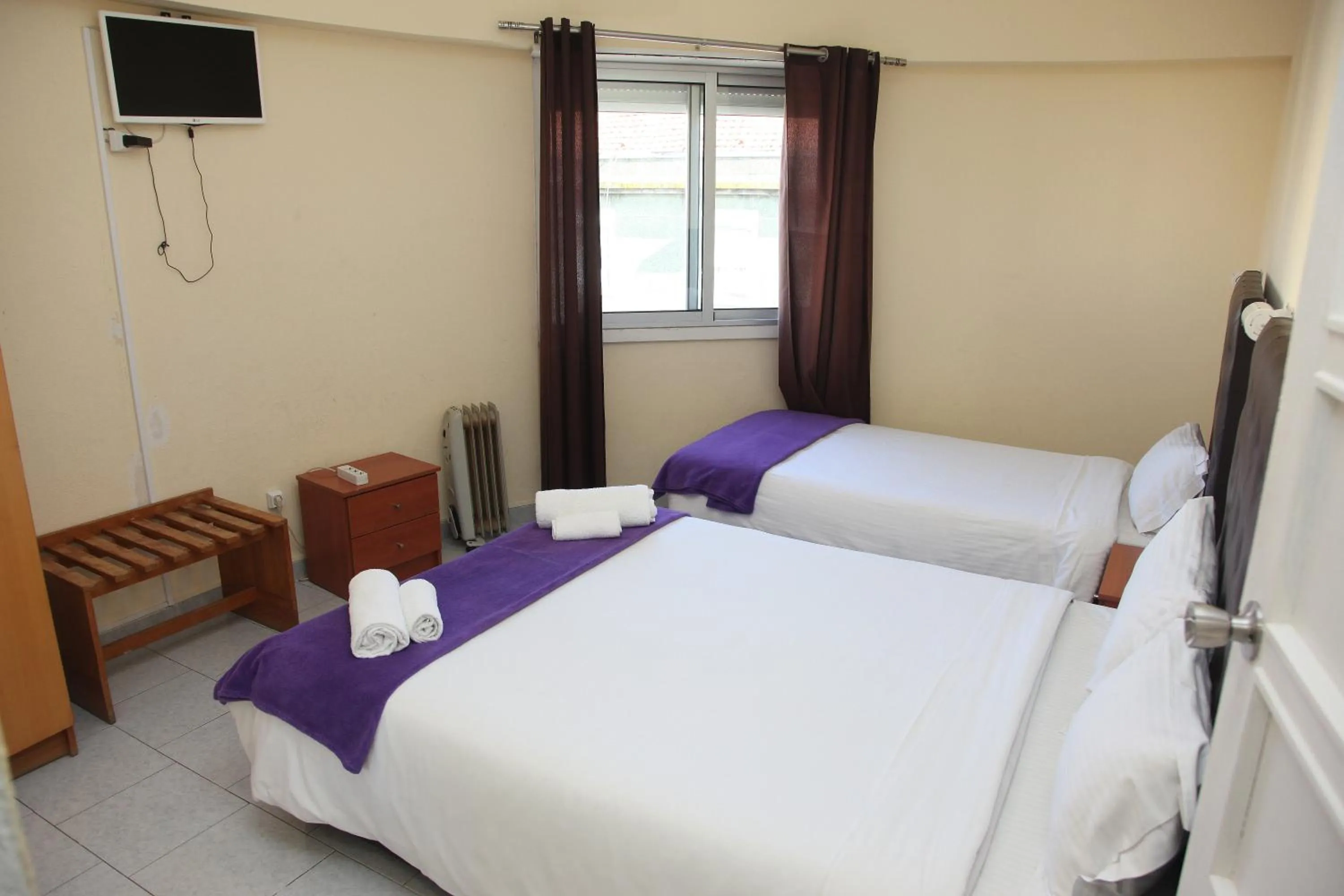 Bed in Lisbon Suite Home