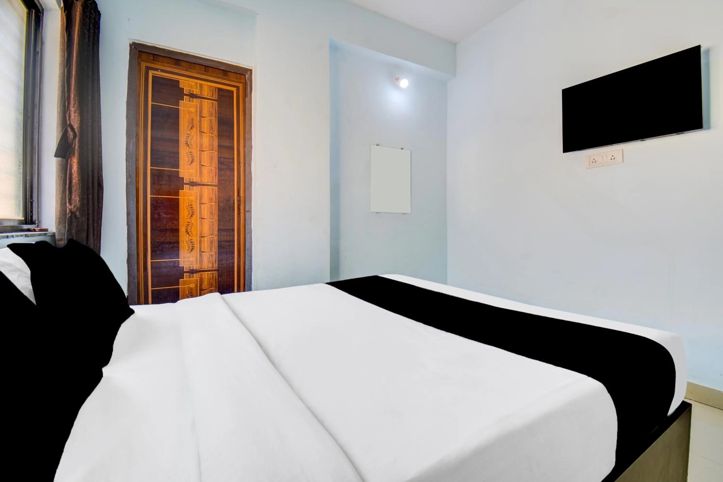 Bedroom, Bed in Hotel O Western Avenue Pune Formerly Happy Stay