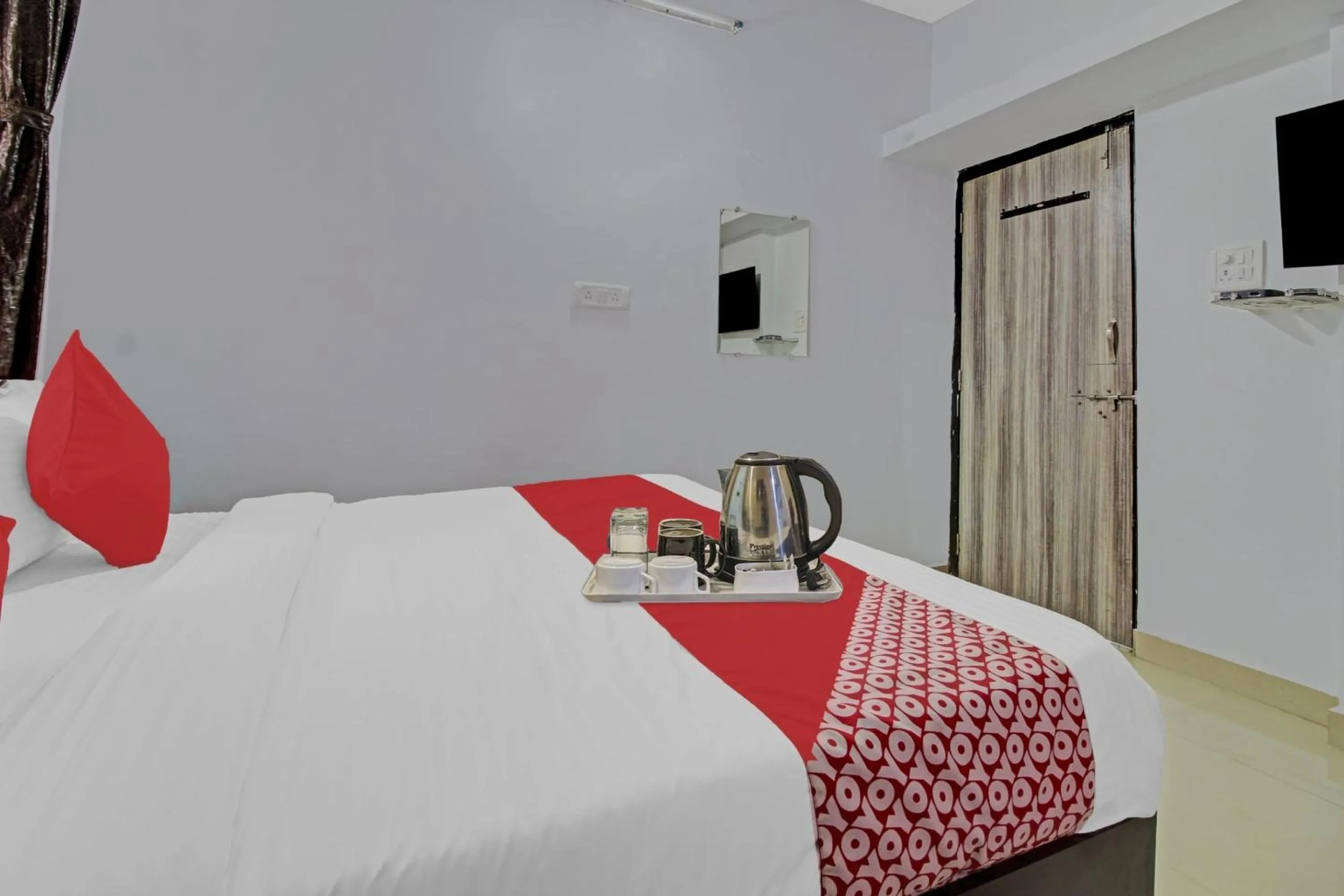 Bedroom, Bed in Hotel O Western Avenue Pune Formerly Happy Stay