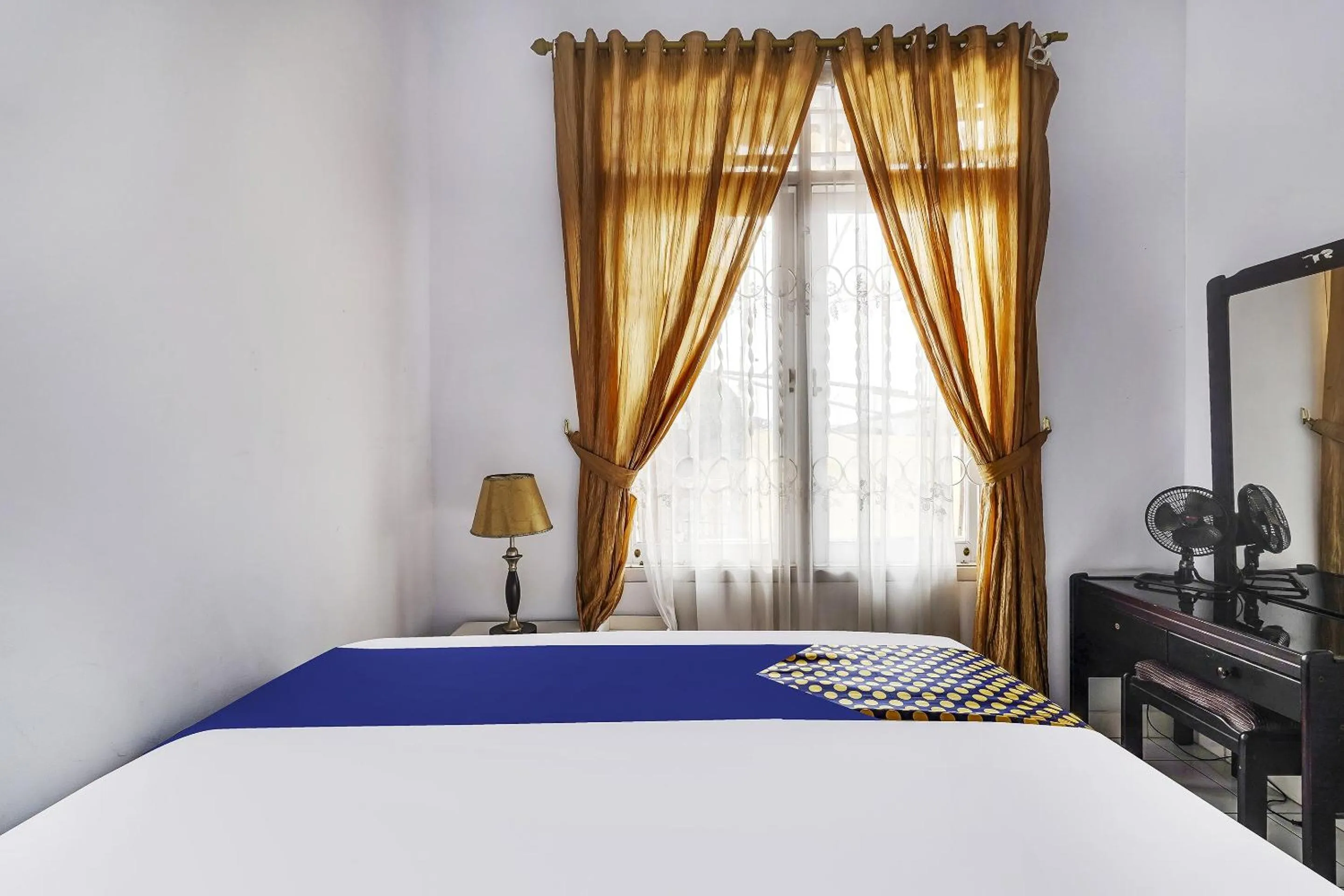 Bedroom in SPOT ON 91107 Villa Galaxy Resort