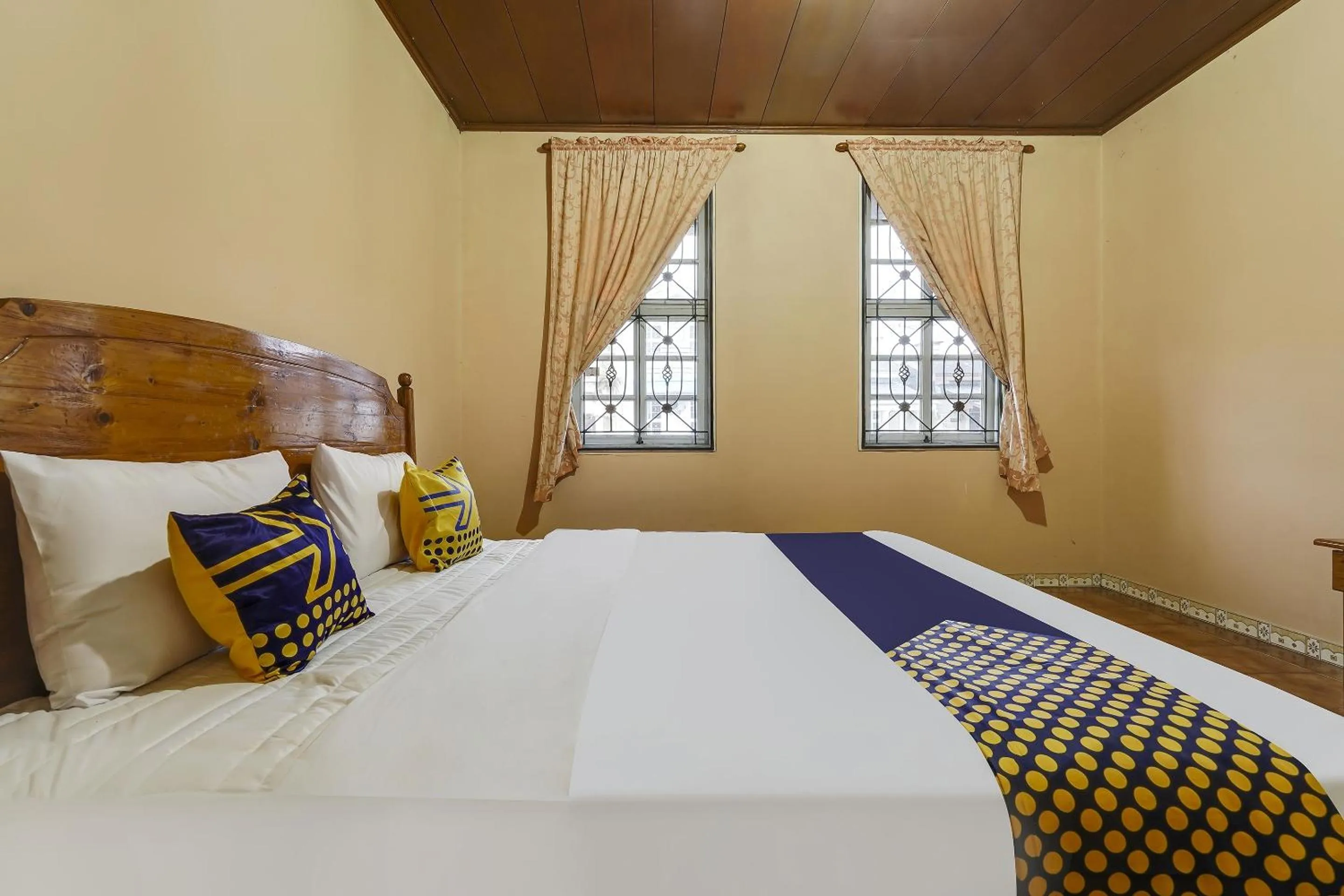 Bedroom in SPOT ON 91107 Villa Galaxy Resort