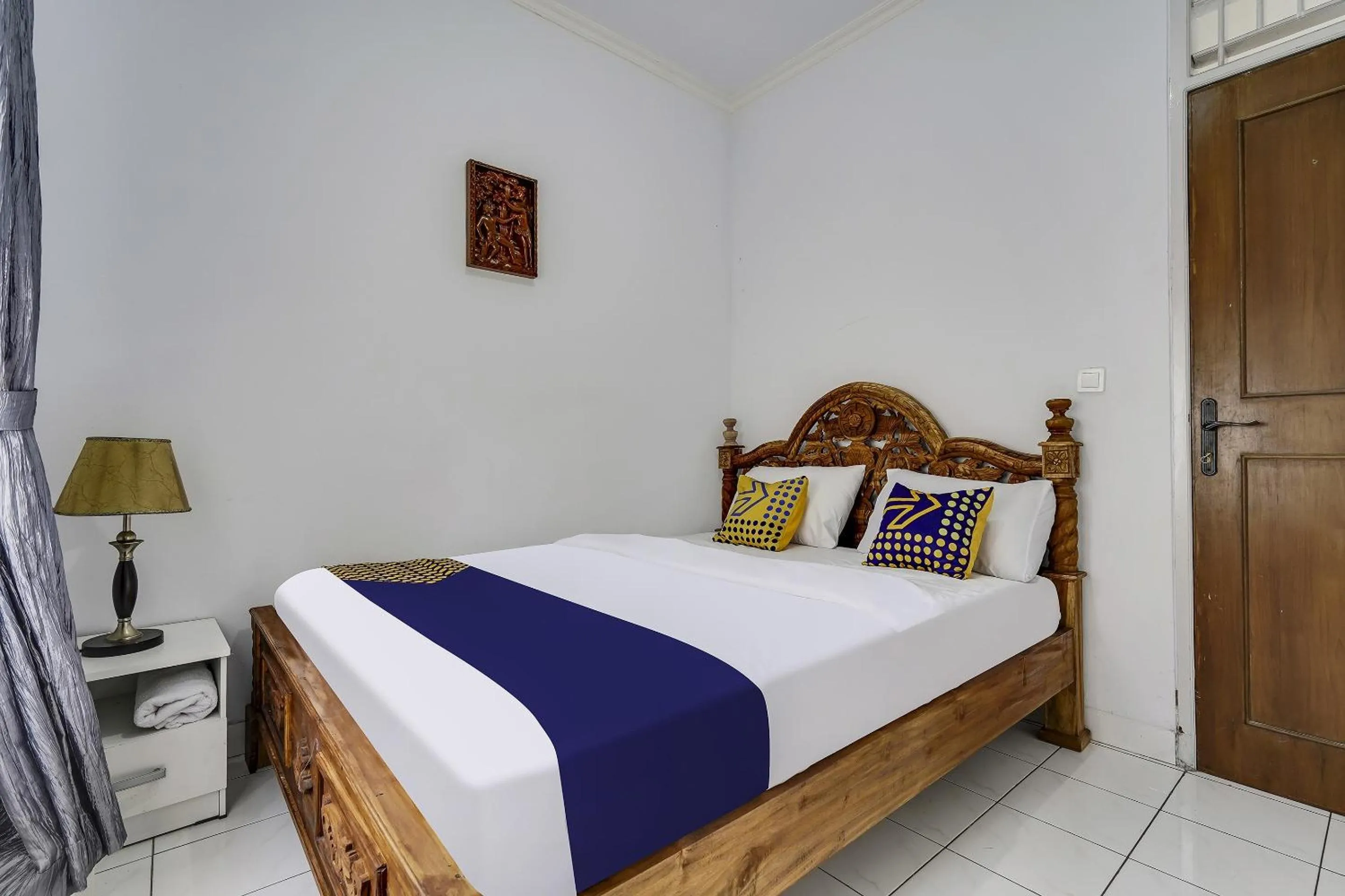 Bedroom in SPOT ON 91107 Villa Galaxy Resort