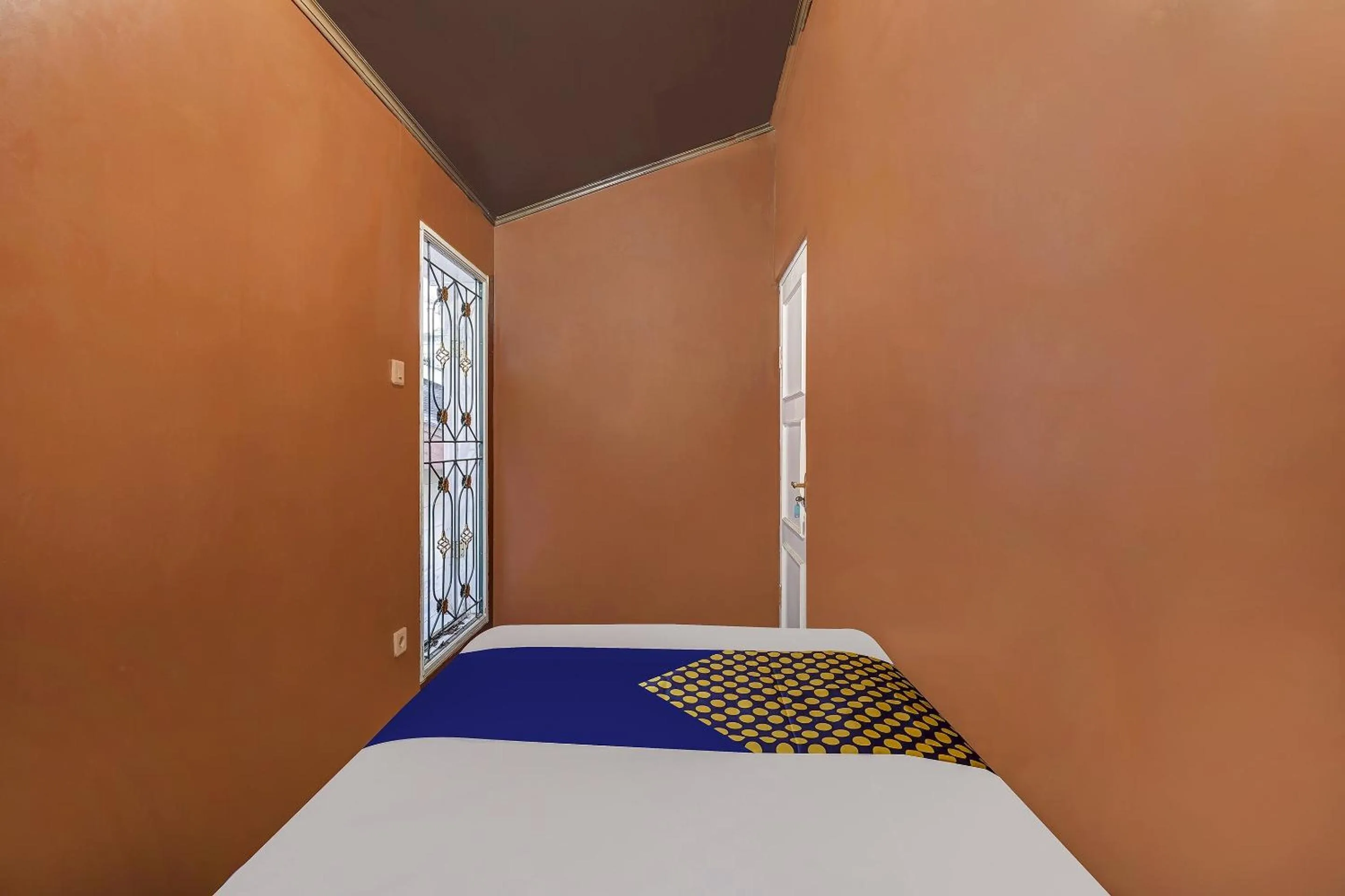 Bedroom in SPOT ON 91107 Villa Galaxy Resort