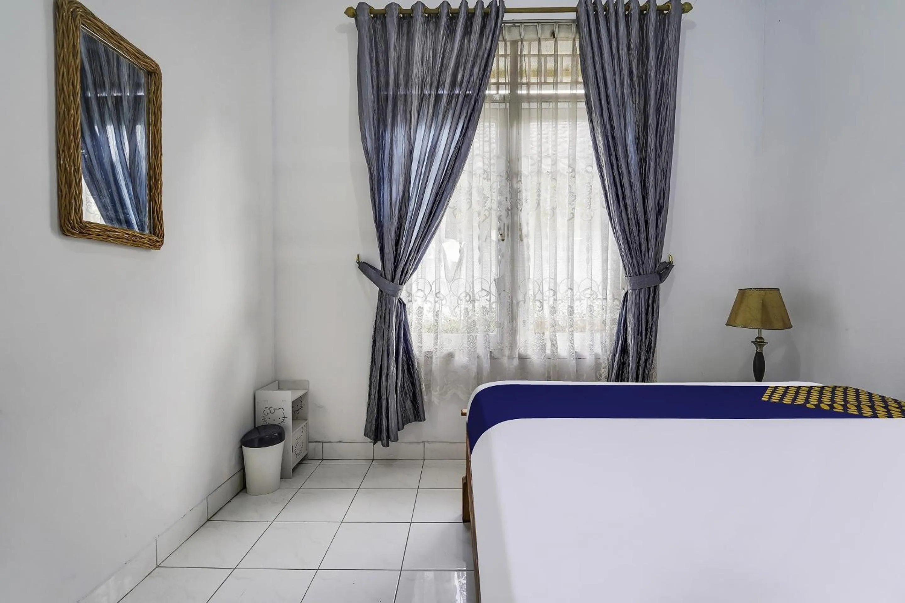 Bedroom in SPOT ON 91107 Villa Galaxy Resort