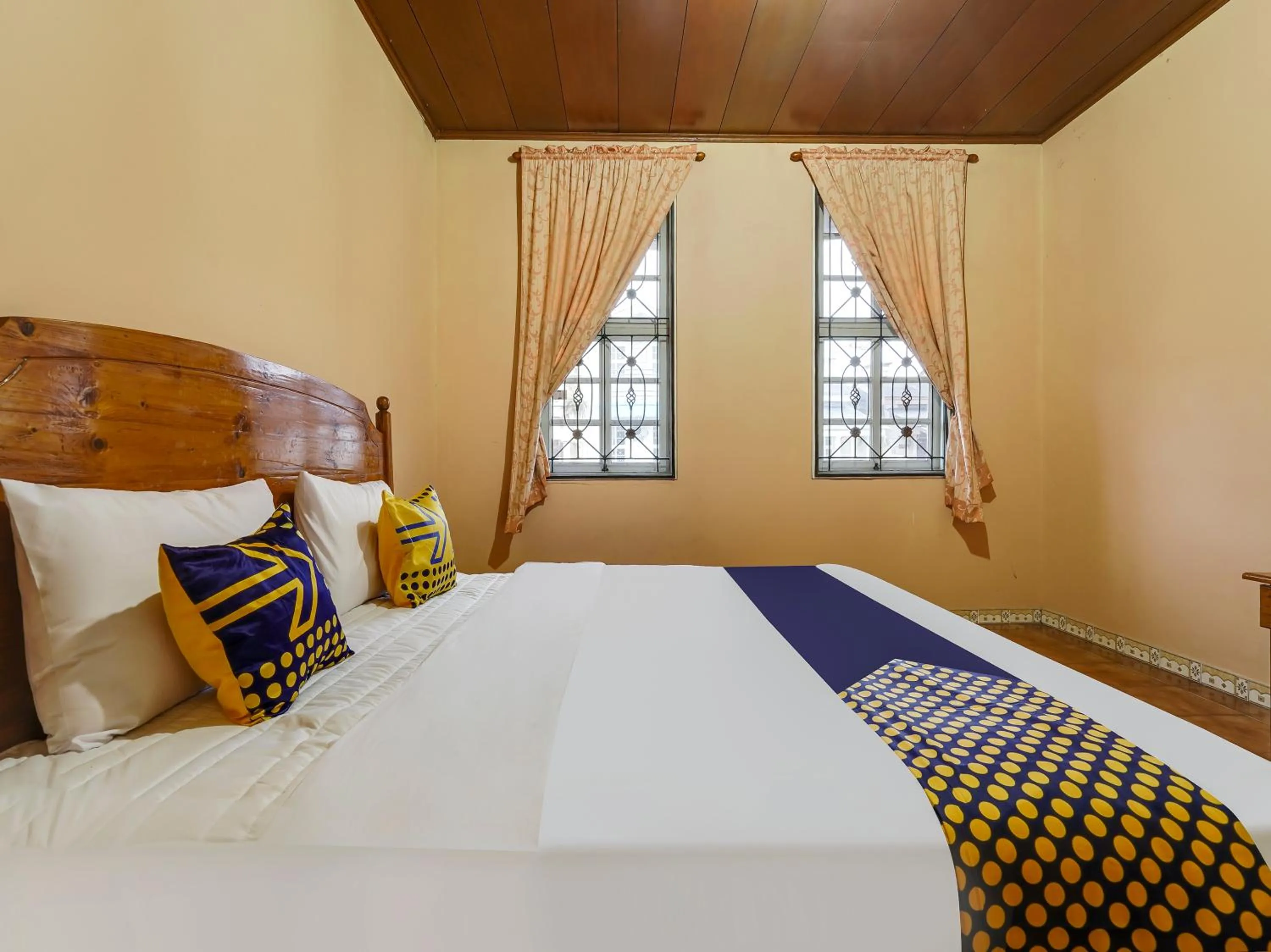 Bedroom in SPOT ON 91107 Villa Galaxy Resort