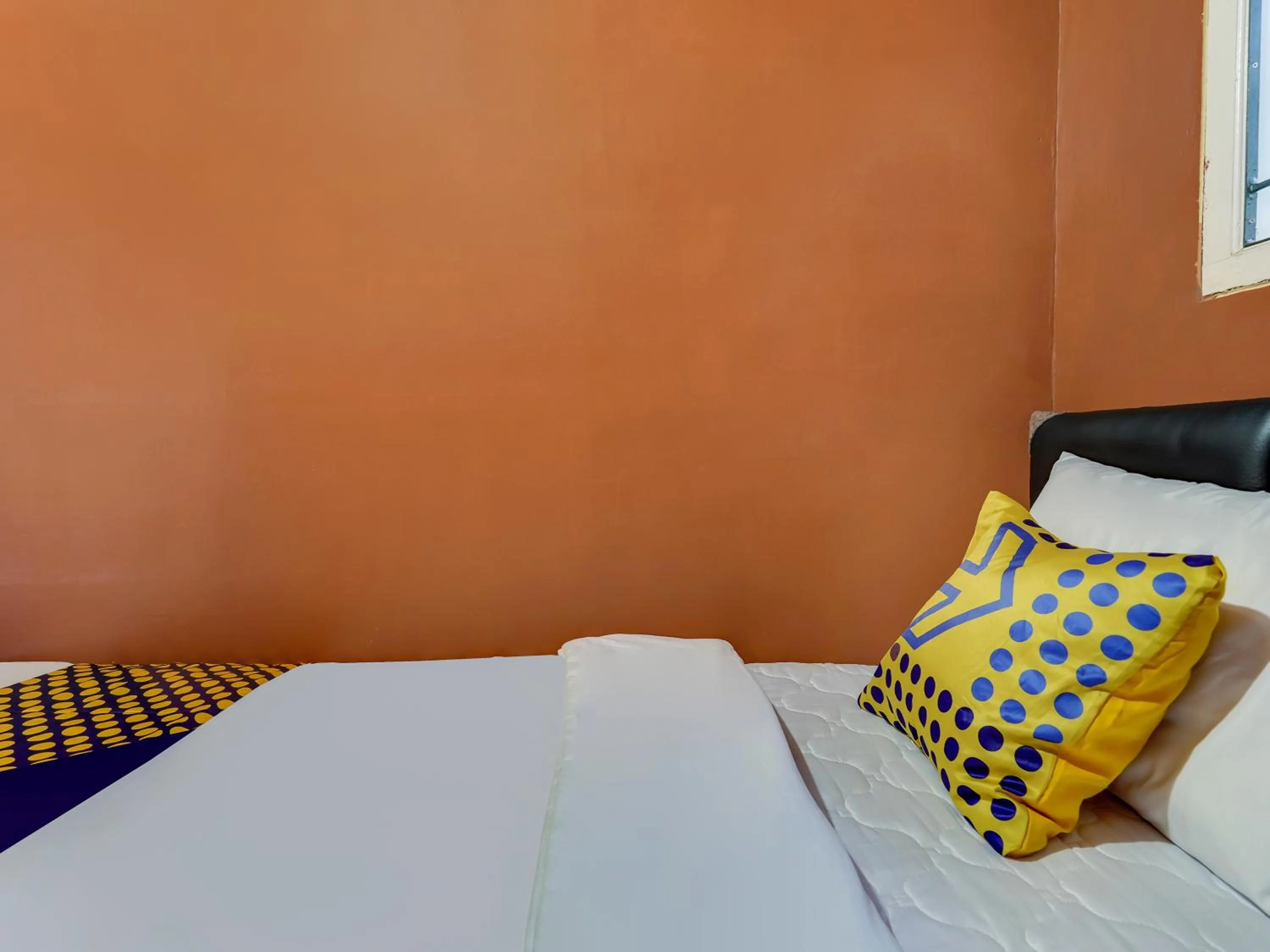 Bedroom in SPOT ON 91107 Villa Galaxy Resort