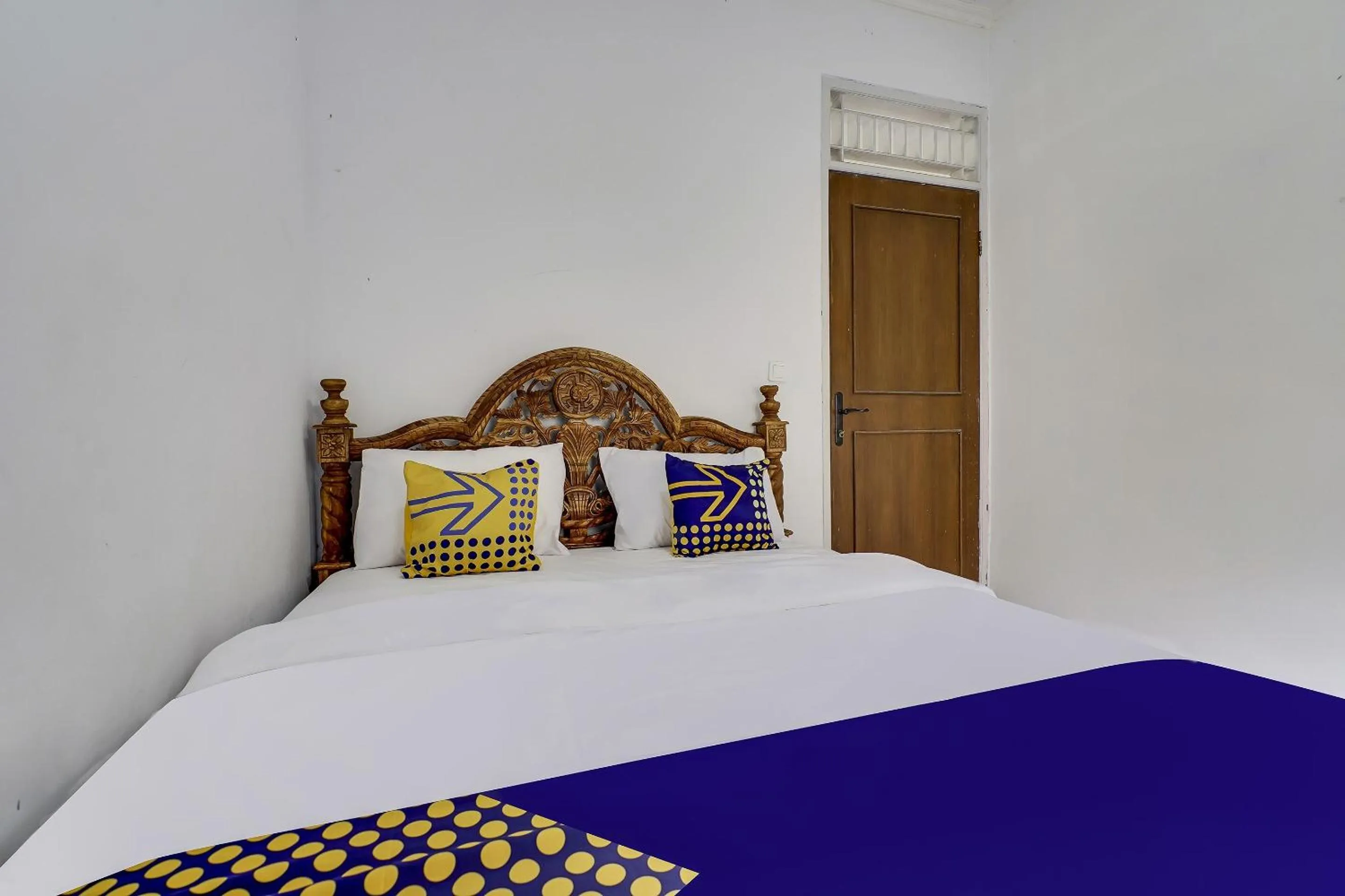 Bedroom in SPOT ON 91107 Villa Galaxy Resort