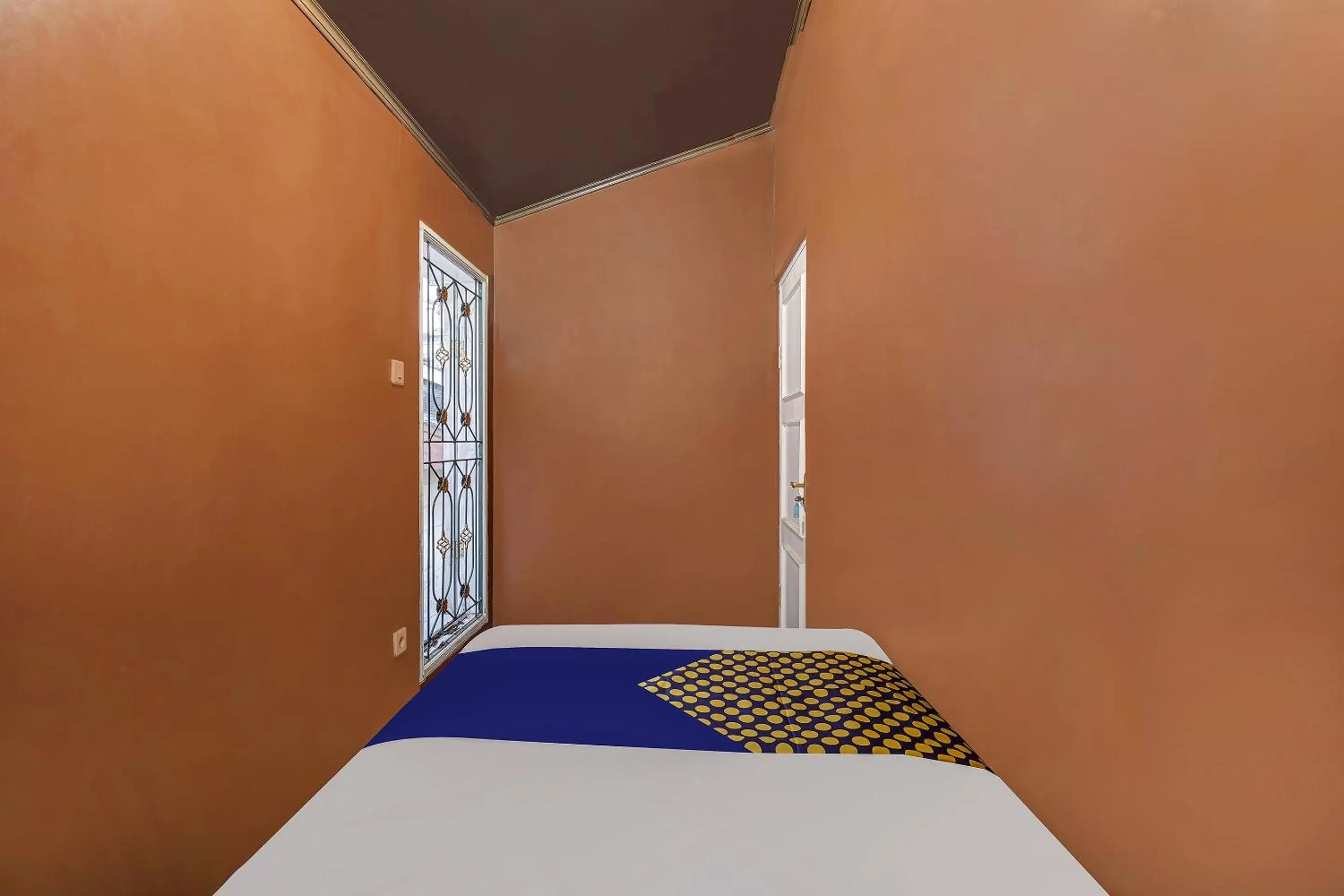 Bedroom in SPOT ON 91107 Villa Galaxy Resort