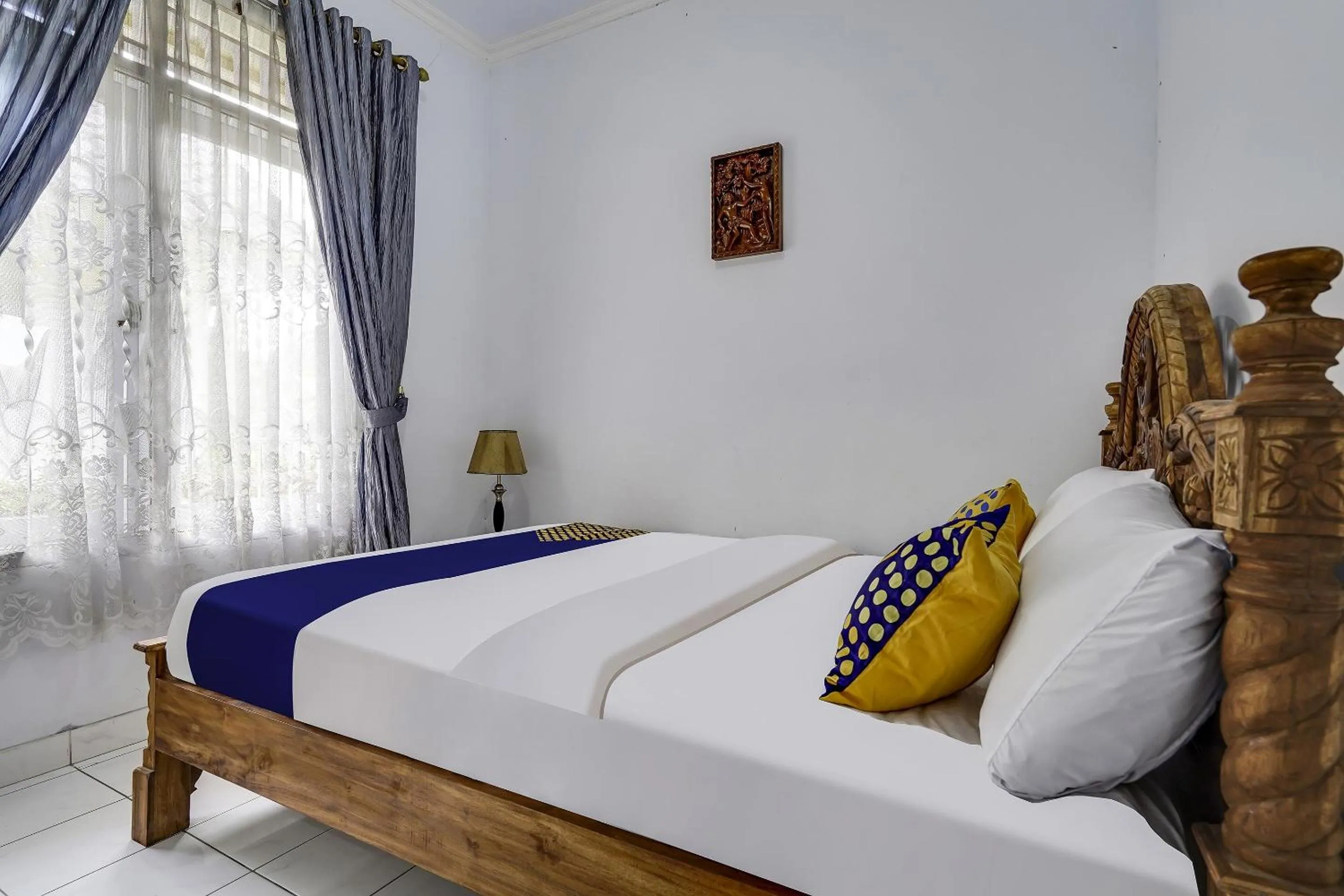 Bedroom in SPOT ON 91107 Villa Galaxy Resort