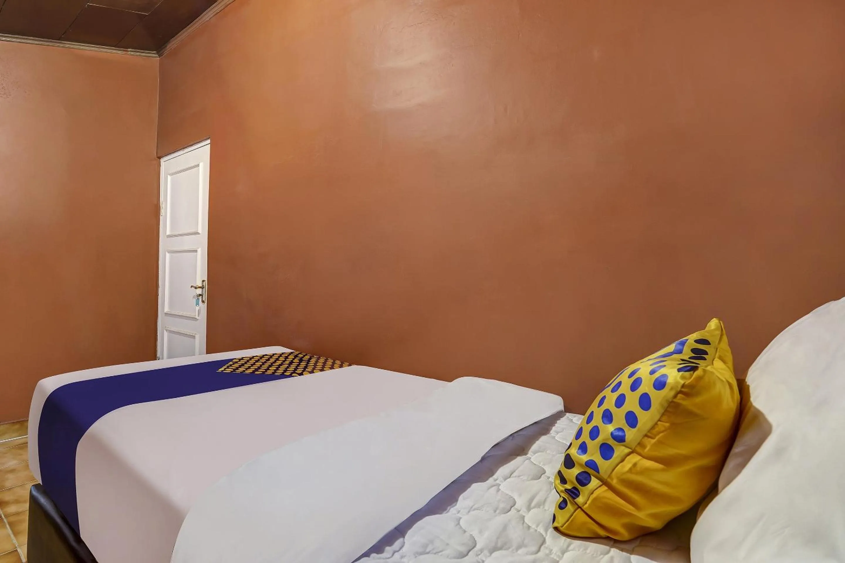 Bedroom in SPOT ON 91107 Villa Galaxy Resort