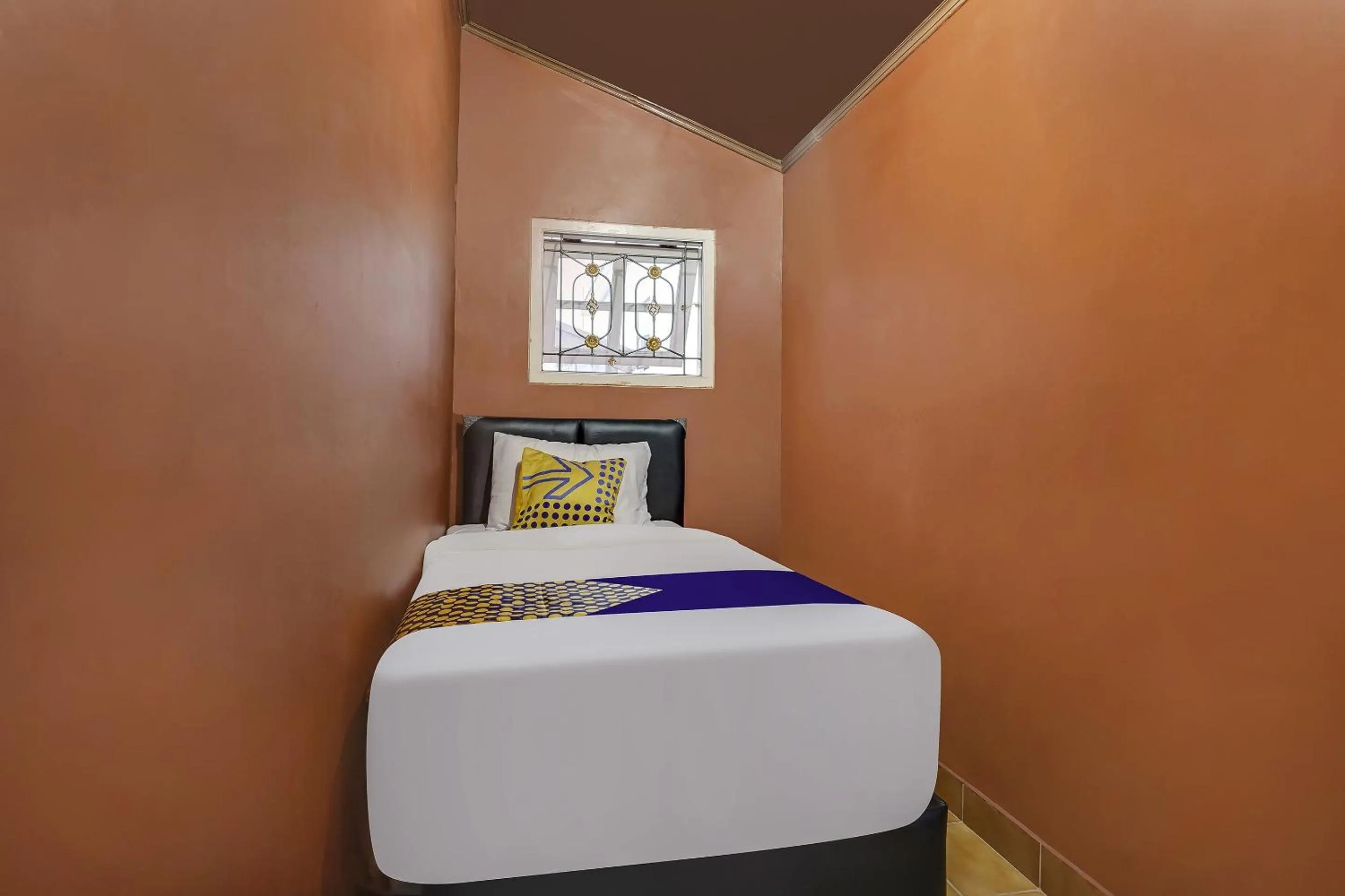 Bedroom in SPOT ON 91107 Villa Galaxy Resort