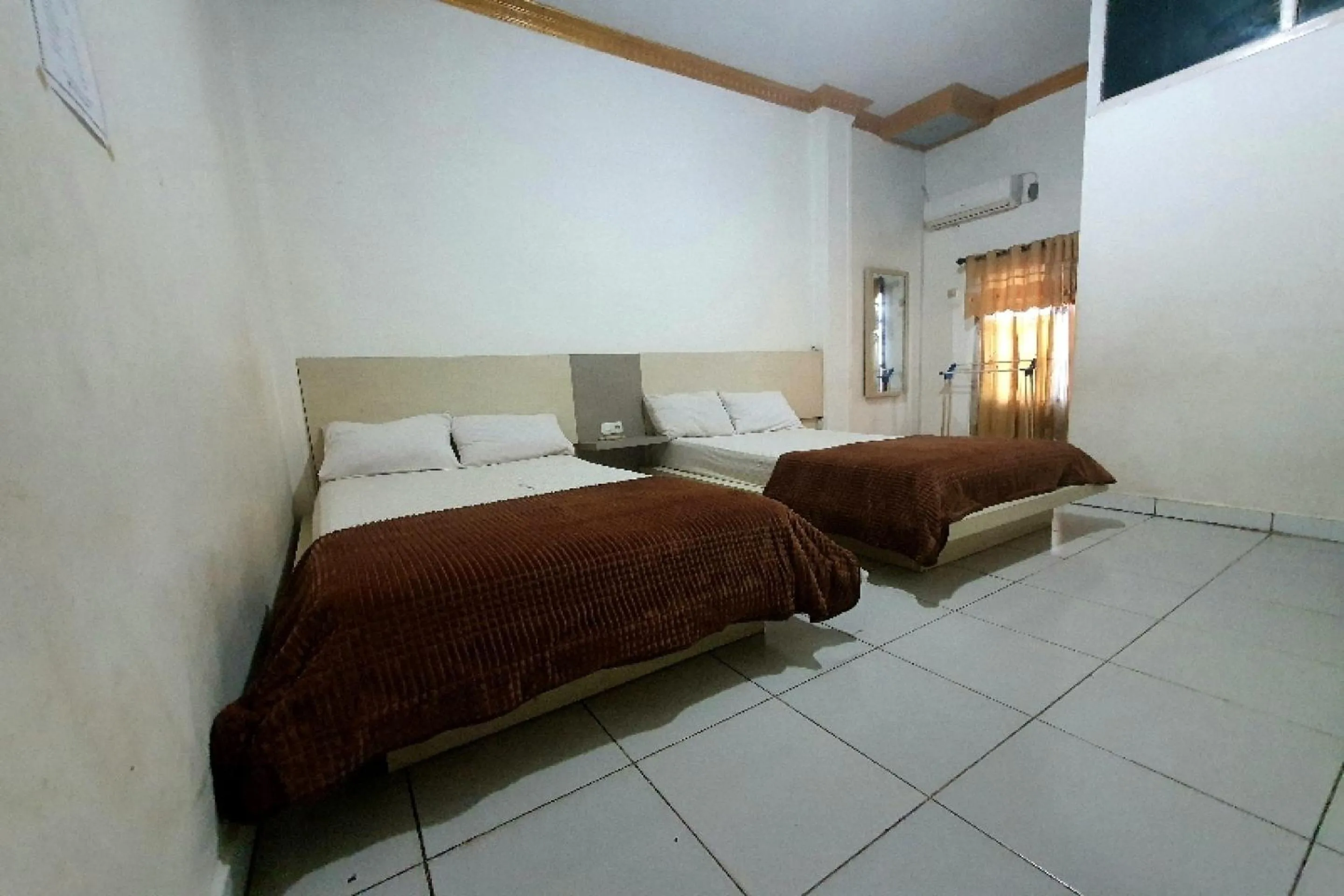 Bedroom in Hotel O Atika