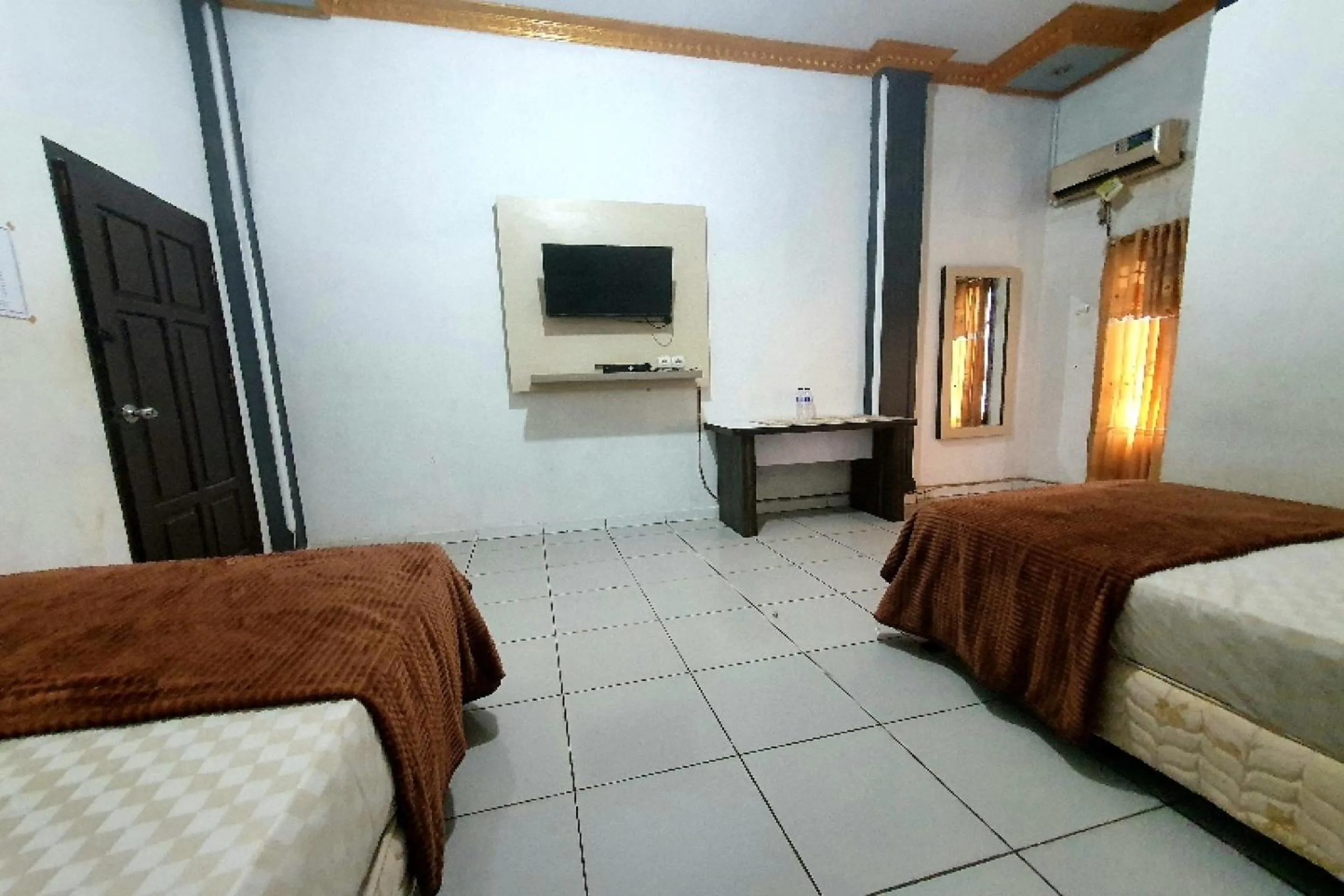 Bedroom in Hotel O Atika