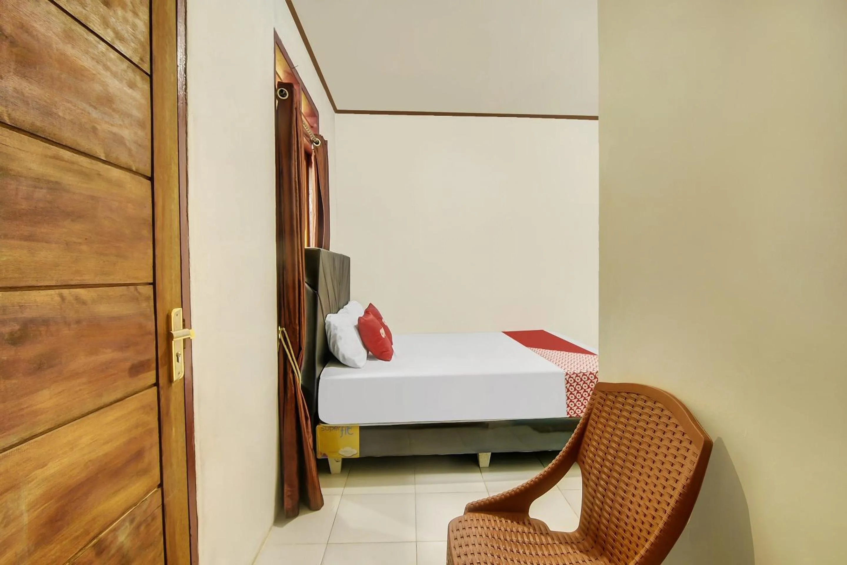 Bedroom in Hotel O Desa Wisata Marinsow Near Gereja Pantekosta Marinsow