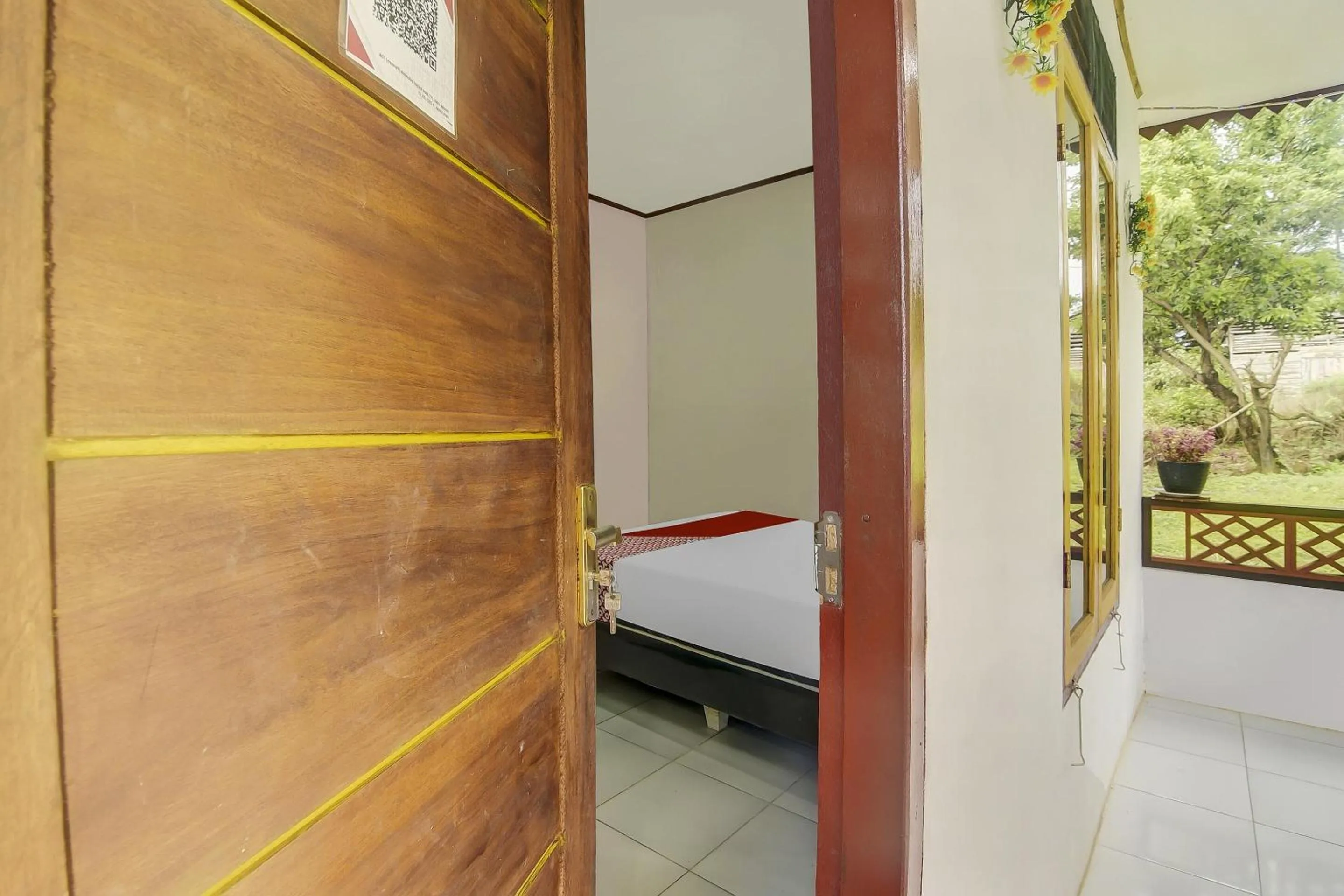 Bedroom in Hotel O Desa Wisata Marinsow Near Gereja Pantekosta Marinsow