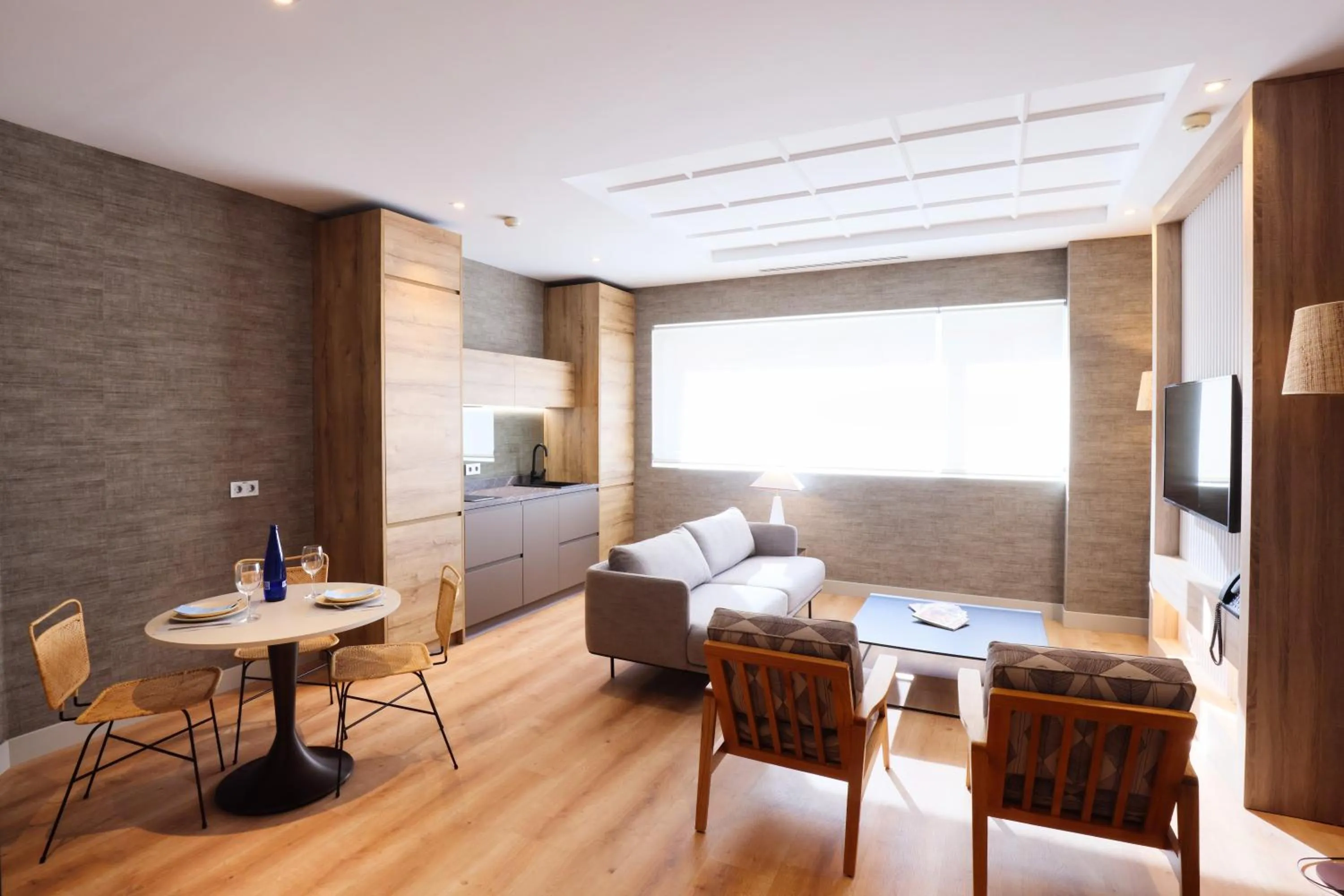 Living room, Bed in THE APARTMENT by assethoteles