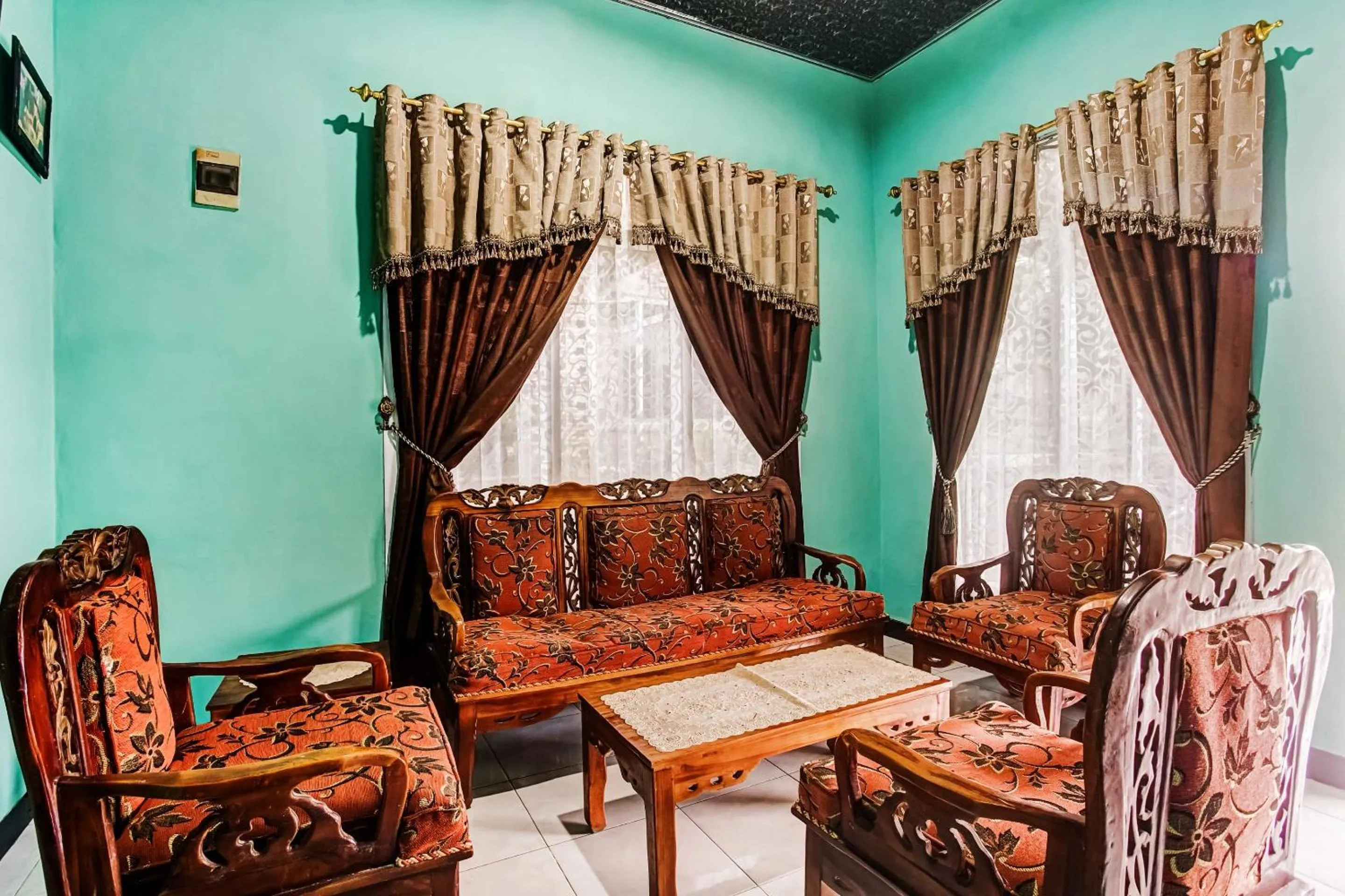 Seating area in Hotel O Desa Wisata Sumber Agung Syariah