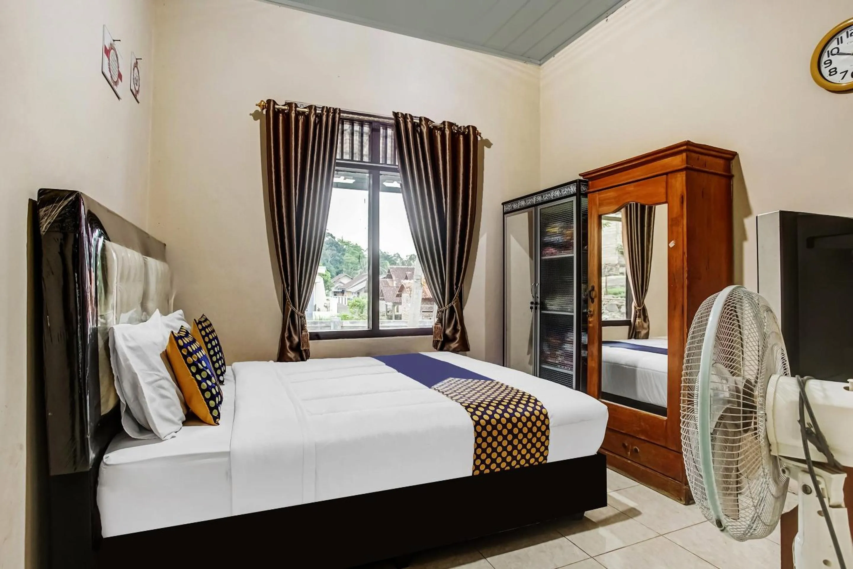 Bedroom in Hotel O Desa Wisata Sumber Agung Syariah
