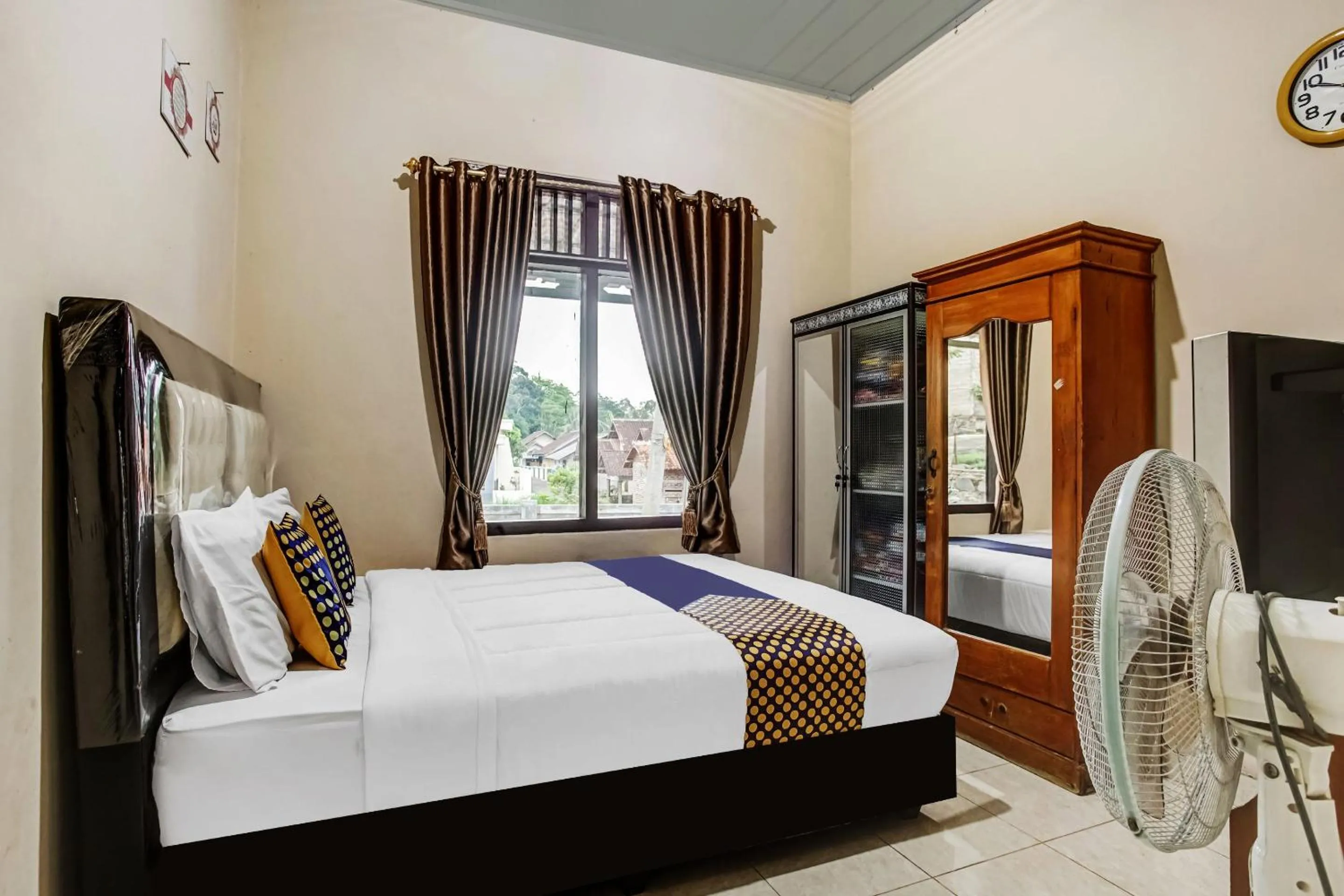 Bedroom in Hotel O Desa Wisata Sumber Agung Syariah