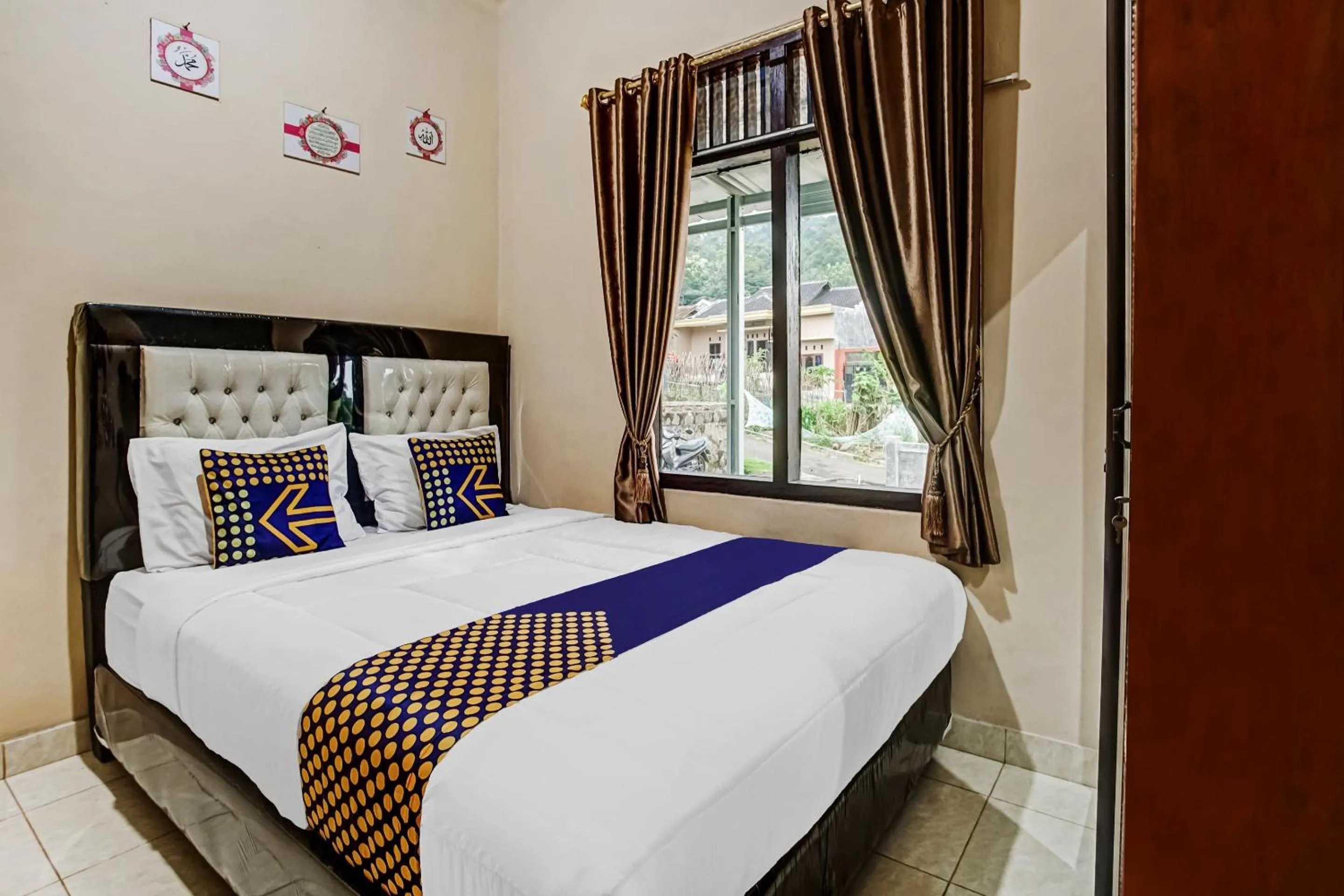 Bedroom in Hotel O Desa Wisata Sumber Agung Syariah