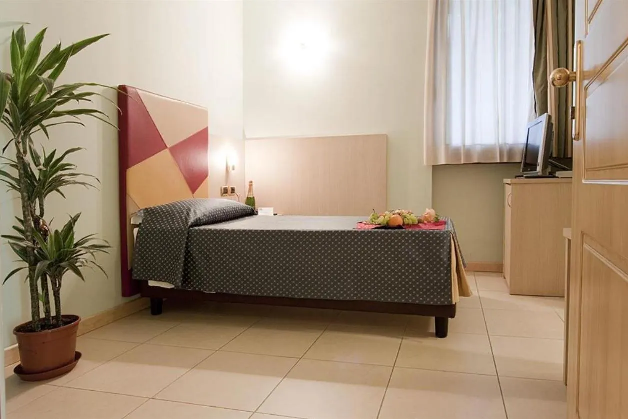 Bed in Hotel Lovere Resort & Spa