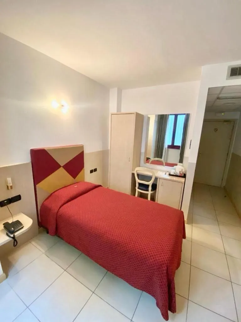 Bed in Hotel Lovere Resort & Spa