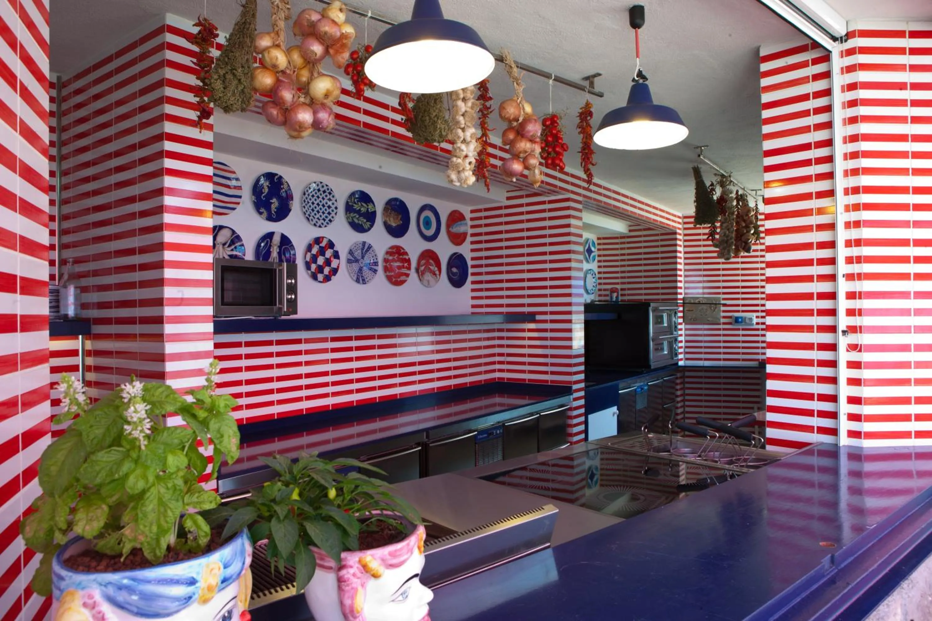 Kitchen or kitchenette in Capo la Gala Hotel&Wellness