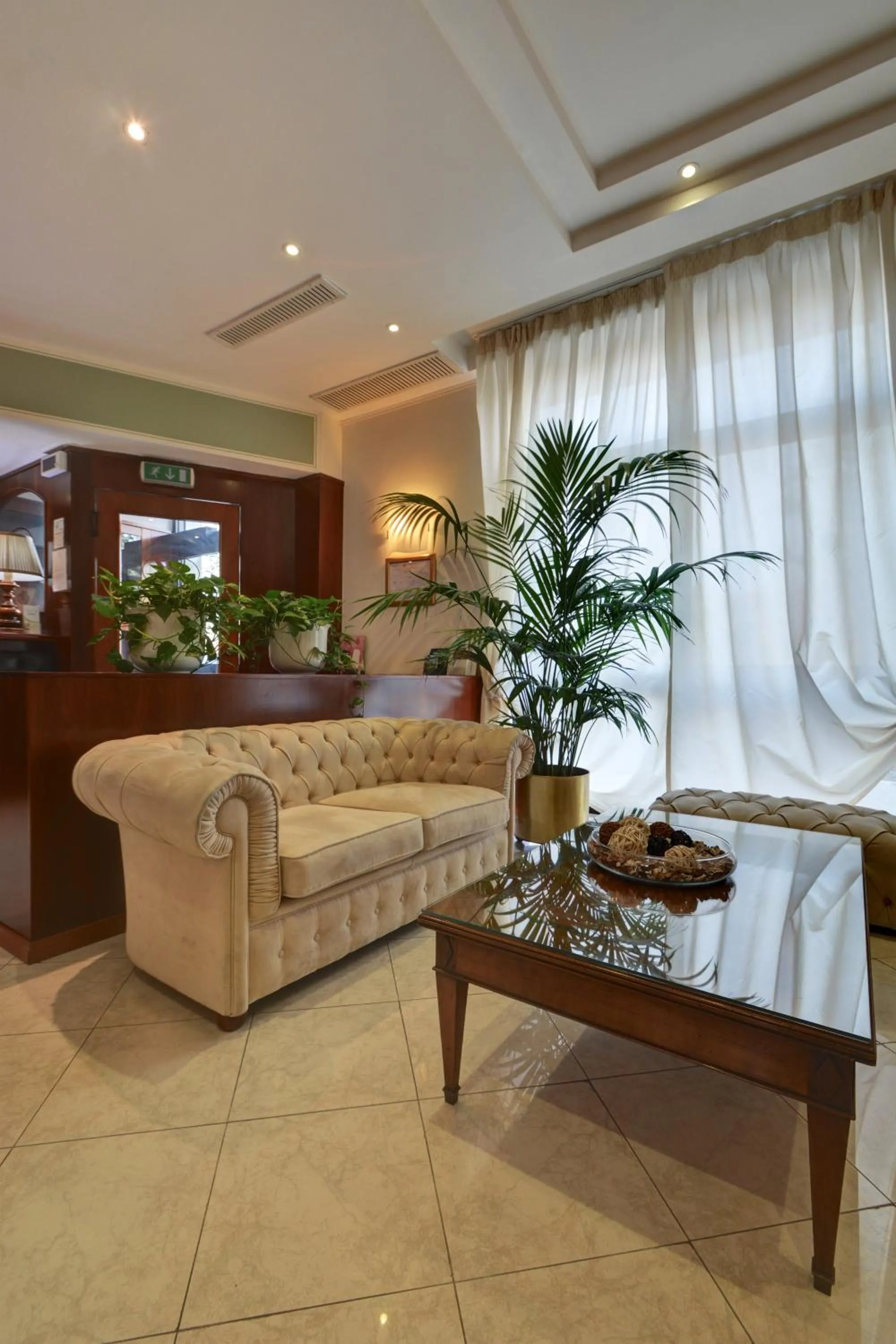 Lobby or reception in Astor Hotel