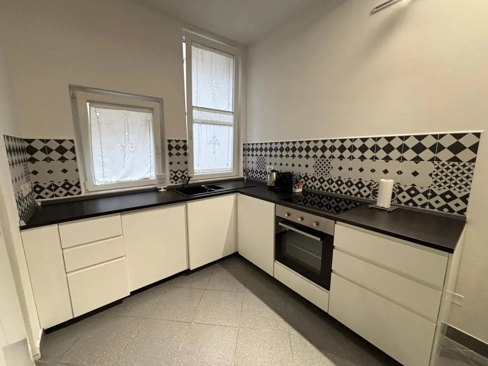 Kitchen or kitchenette in Phi Hotel Bologna Apartments