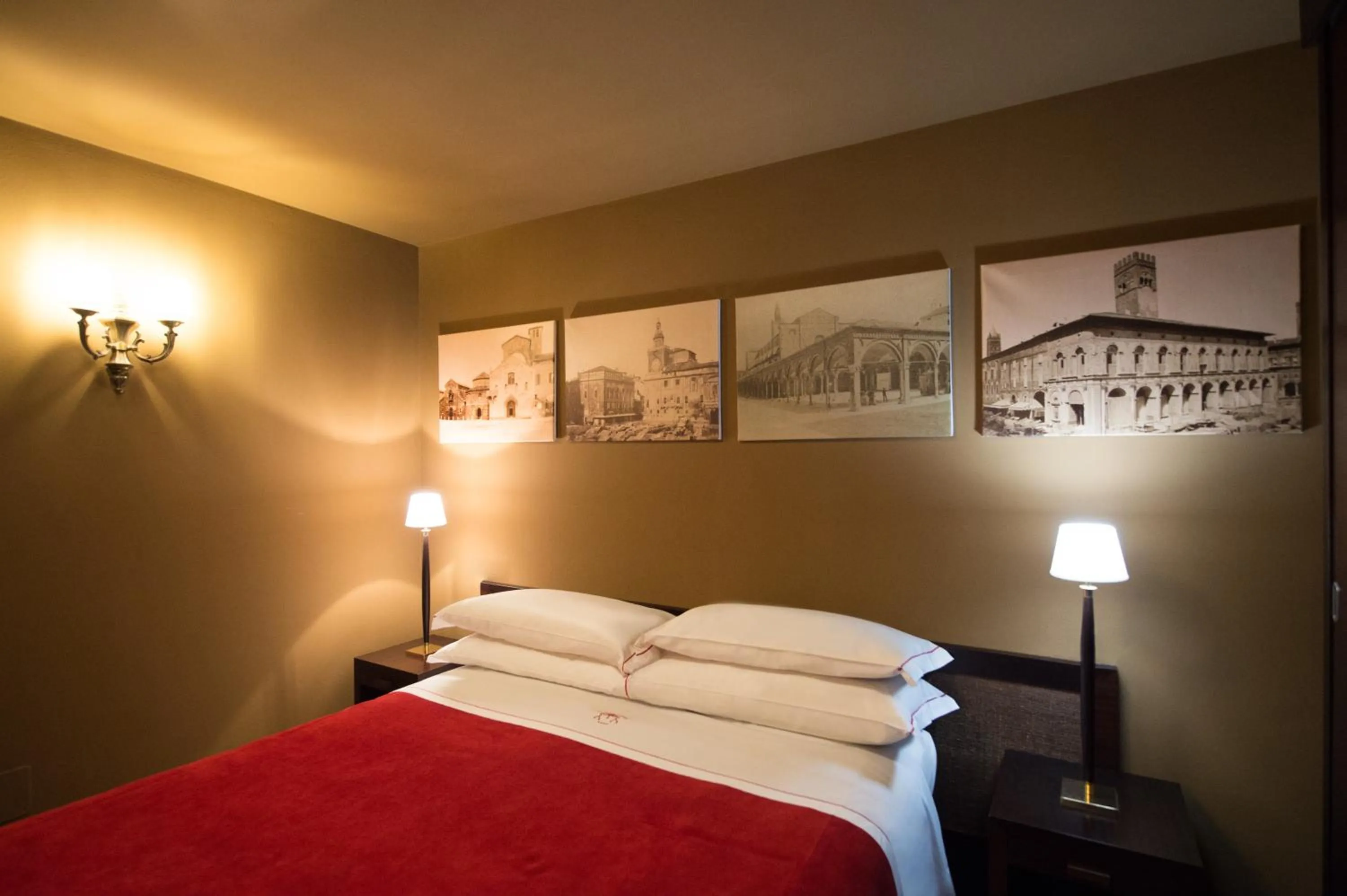 Bed in Phi Hotel Bologna Apartments