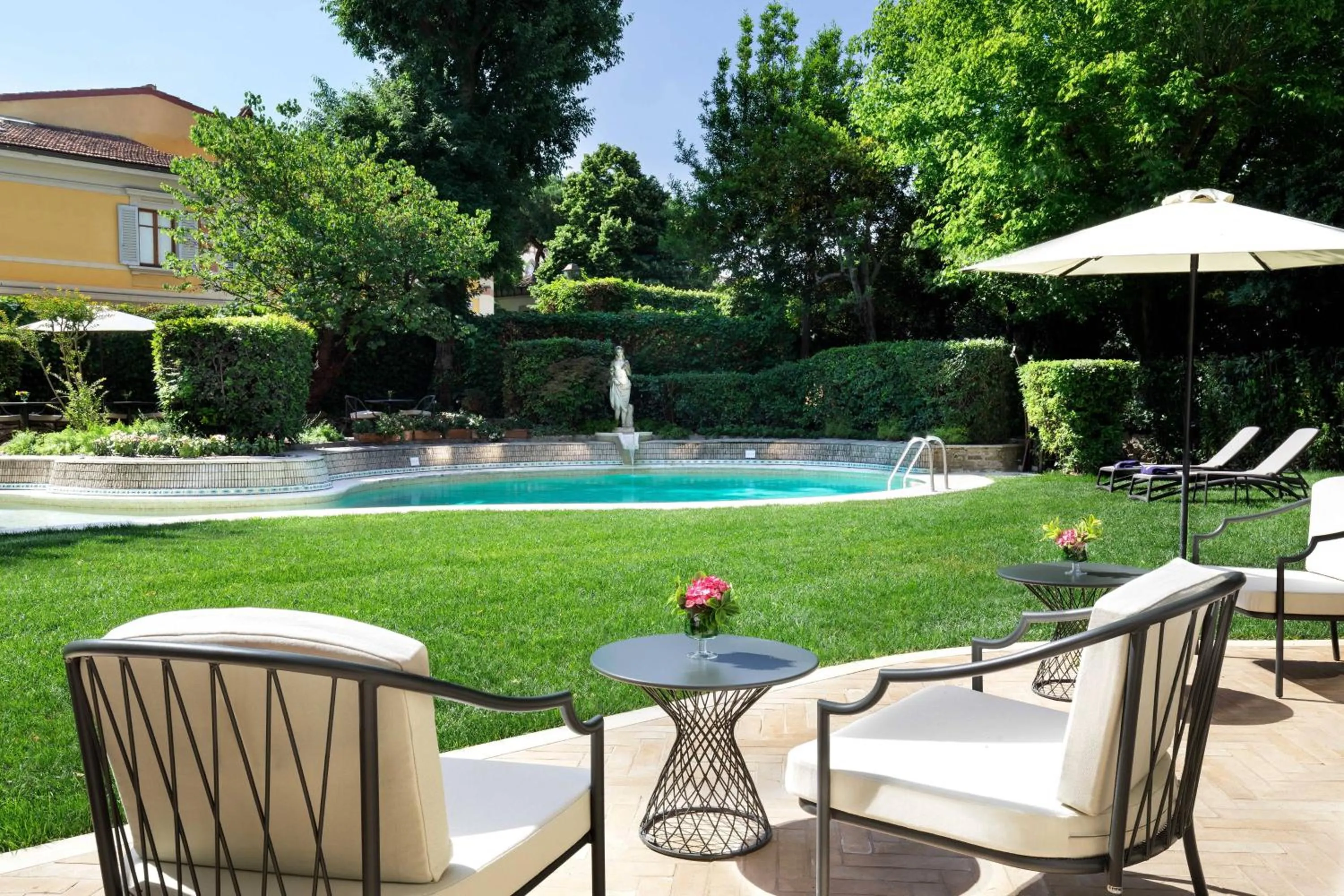 Swimming pool in Sina Villa Medici, Autograph Collection