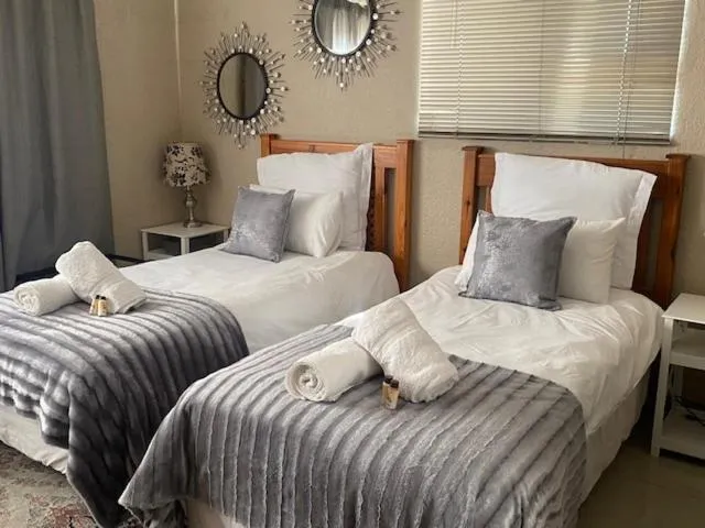 Bed in Black Diamond B&B Guesthouse