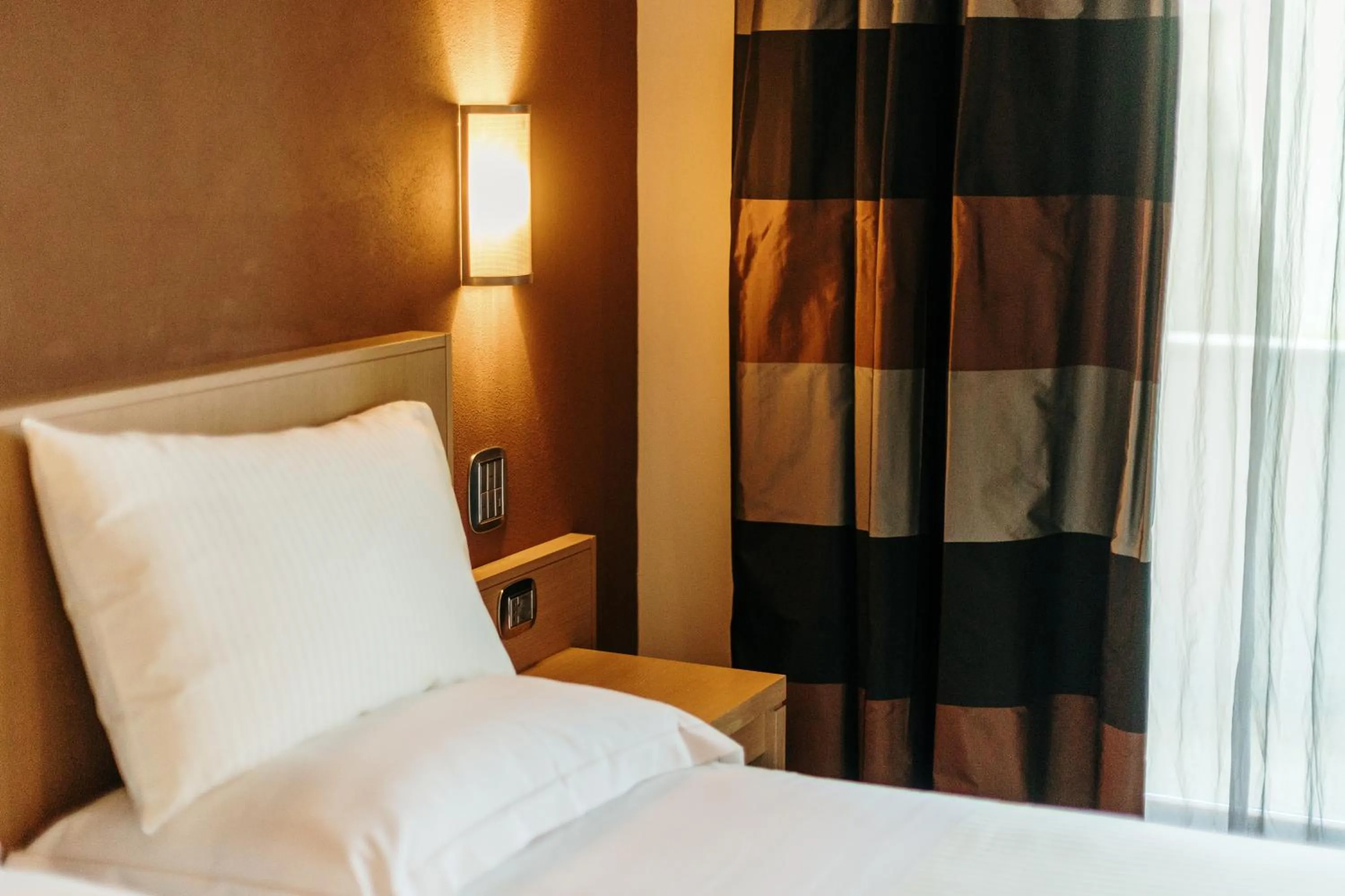 Bed in Hotel Dei Vicari