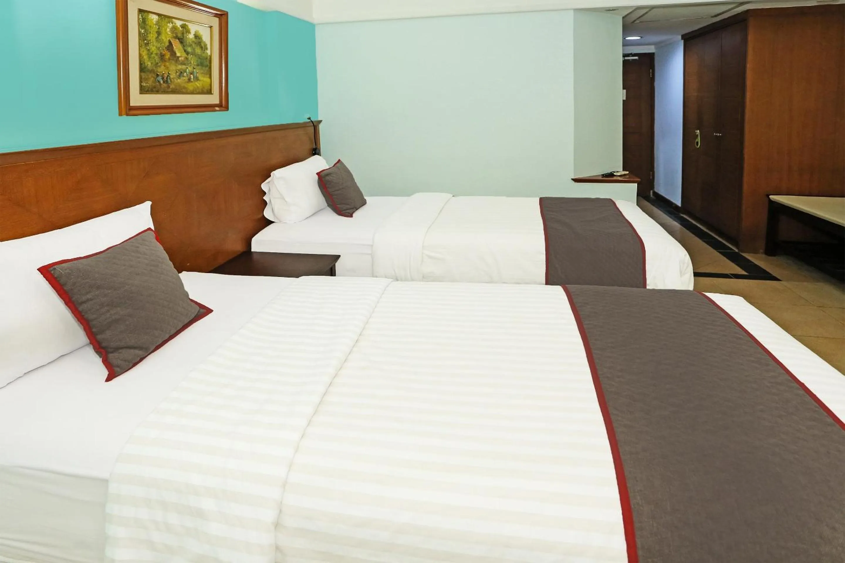 Bedroom in Collection O 91898 Series Hotel Kuningan