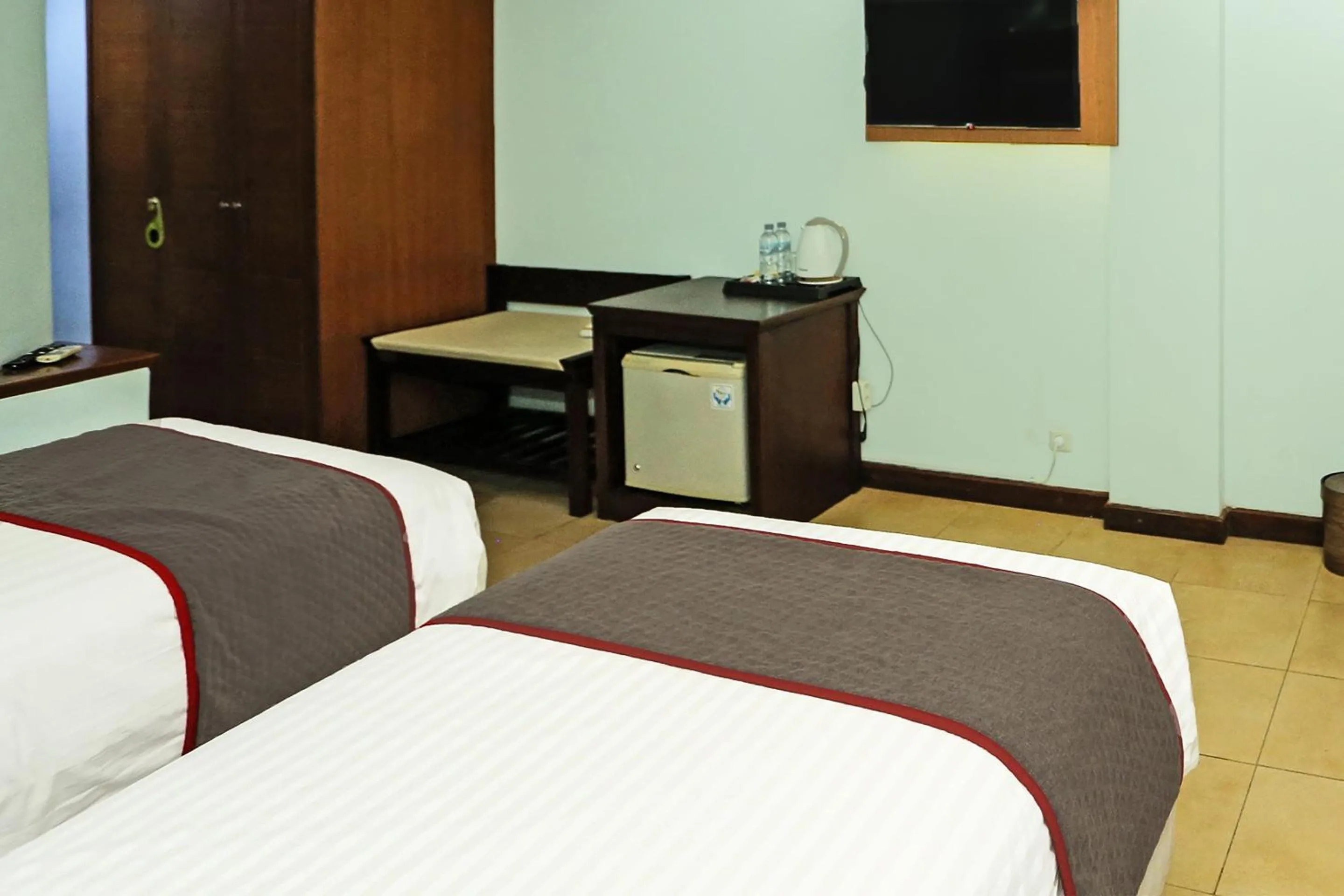 Bedroom in Collection O 91898 Series Hotel Kuningan